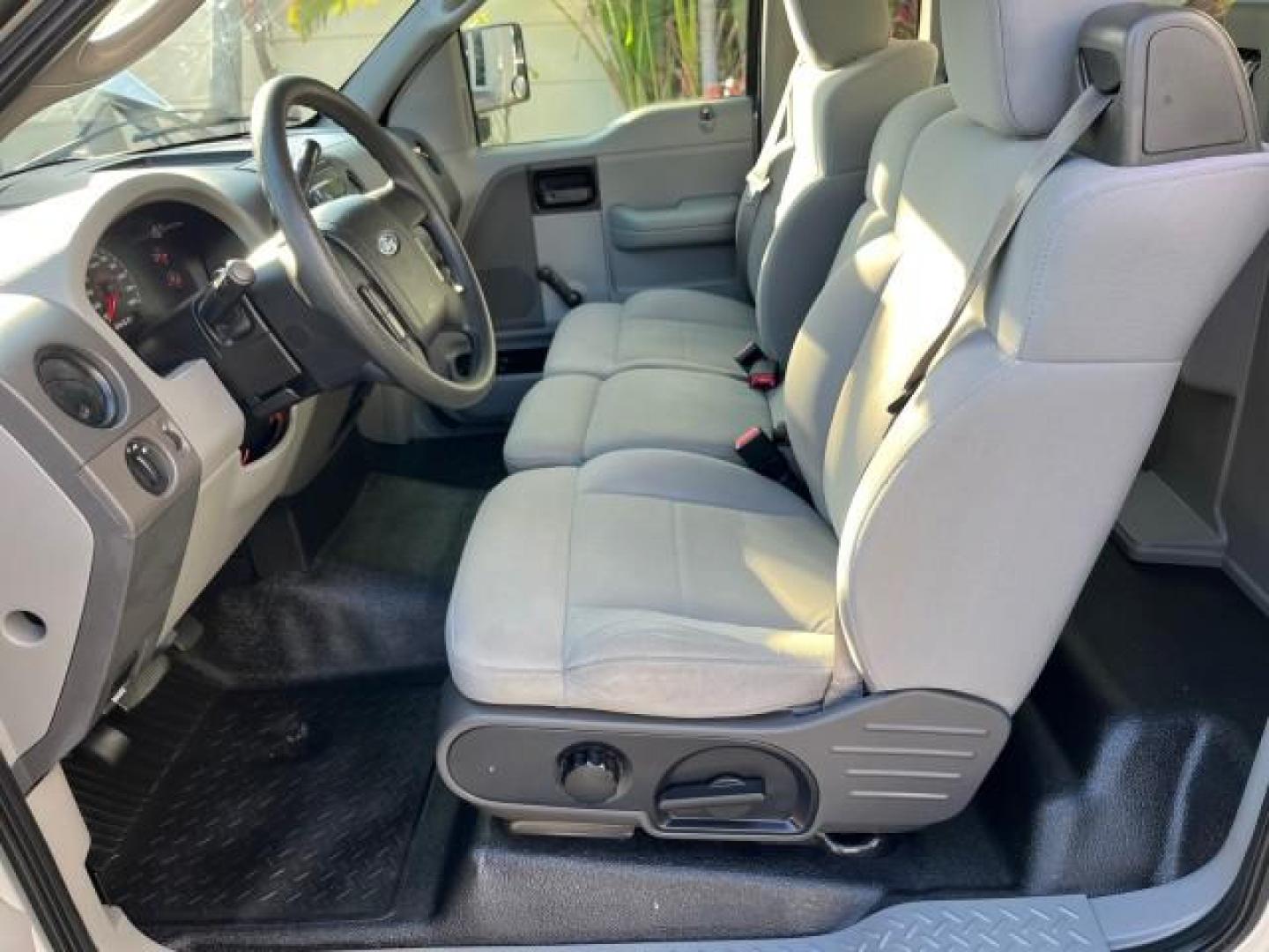 2007 Silver Metallic /Flint Ford F-150 XL LOW MILES 64,614 (1FTRF12257K) with an 4.2L EFI V6 Engine engine, Automatic transmission, located at 4701 North Dixie Hwy, Pompano Beach, FL, 33064, (954) 422-2889, 26.240938, -80.123474 - OUR WEBPAGE FLORIDACARS1.COM HAS OVER 100 PHOTOS AND FREE CARFAX LINK 2007 FORD F-150 XL ROAD READY WORK READY VIN: 1FTRF12257KB67107 FLORIDA OWNER PICKUP LOW MILES 64,614 4.2L V6 F POWER MIRRORS GASOLINE 25 SERVICE RECORDS REAR WHEEL DRIVE 6.6 FT BED LENGTH Anti-Theft System Electronic Braking Syst - Photo#37