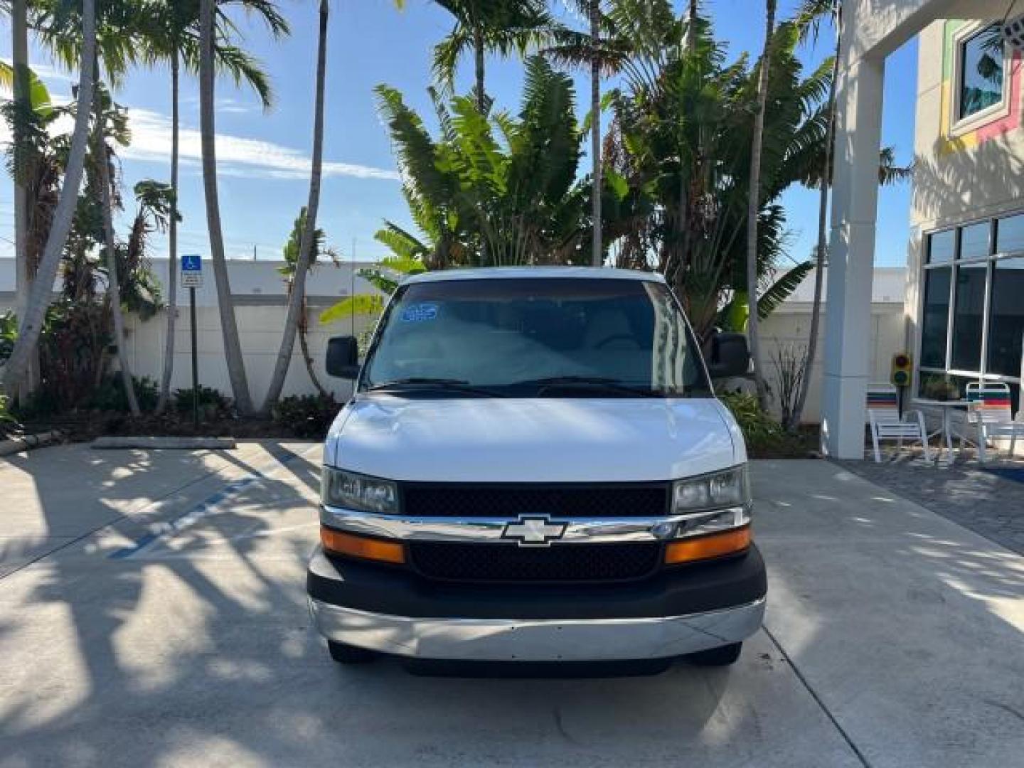 2003 Summit White /Neutral Chevrolet Express Passenger 15 LOW MILES 69,483 (1GAHG39U731) with an 6.0L Vortec 6000 V8 SFI Engine engine, Automatic transmission, located at 4701 North Dixie Hwy, Pompano Beach, FL, 33064, (954) 422-2889, 26.240938, -80.123474 - OUR WEBPAGE FLORIDACARS1.COM HAS OVER 100 PHOTOS AND FREE CARFAX LINK 2003 CHEVROLET EXPRESS 3500 ROAD READY WORK READY VIN: 1GAHG39U731131035 NO RECALLS 6.0L V8 VAN FLORIDA OWNER 6.0L V8 F LOW MILES 69,483 GASOLINE 15 PASSENGER REAR WHEEL DRIVE POWER MIRRORS Front Bucket Seats RWD Rear Air Conditio - Photo#2