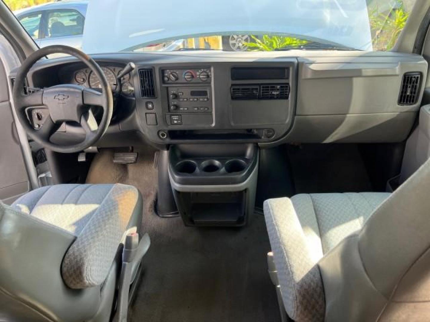 2003 Summit White /Neutral Chevrolet Express Passenger 15 LOW MILES 69,483 (1GAHG39U731) with an 6.0L Vortec 6000 V8 SFI Engine engine, Automatic transmission, located at 4701 North Dixie Hwy, Pompano Beach, FL, 33064, (954) 422-2889, 26.240938, -80.123474 - OUR WEBPAGE FLORIDACARS1.COM HAS OVER 100 PHOTOS AND FREE CARFAX LINK 2003 CHEVROLET EXPRESS 3500 ROAD READY WORK READY VIN: 1GAHG39U731131035 NO RECALLS 6.0L V8 VAN FLORIDA OWNER 6.0L V8 F LOW MILES 69,483 GASOLINE 15 PASSENGER REAR WHEEL DRIVE POWER MIRRORS Front Bucket Seats RWD Rear Air Conditio - Photo#33