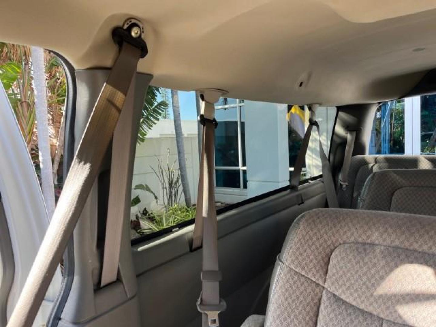 2003 Summit White /Neutral Chevrolet Express Passenger 15 LOW MILES 69,483 (1GAHG39U731) with an 6.0L Vortec 6000 V8 SFI Engine engine, Automatic transmission, located at 4701 North Dixie Hwy, Pompano Beach, FL, 33064, (954) 422-2889, 26.240938, -80.123474 - OUR WEBPAGE FLORIDACARS1.COM HAS OVER 100 PHOTOS AND FREE CARFAX LINK 2003 CHEVROLET EXPRESS 3500 ROAD READY WORK READY VIN: 1GAHG39U731131035 NO RECALLS 6.0L V8 VAN FLORIDA OWNER 6.0L V8 F LOW MILES 69,483 GASOLINE 15 PASSENGER REAR WHEEL DRIVE POWER MIRRORS Front Bucket Seats RWD Rear Air Conditio - Photo#36