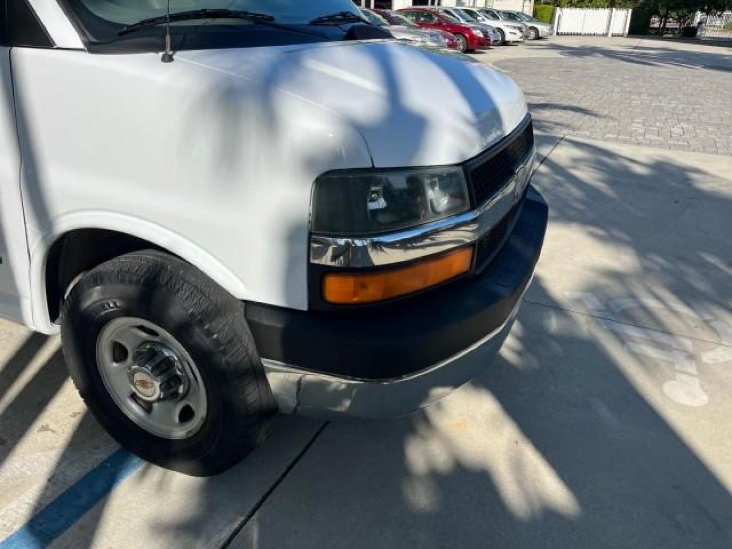 2003 Summit White /Neutral Chevrolet Express Passenger 15 LOW MILES 69,483 (1GAHG39U731) with an 6.0L Vortec 6000 V8 SFI Engine engine, Automatic transmission, located at 4701 North Dixie Hwy, Pompano Beach, FL, 33064, (954) 422-2889, 26.240938, -80.123474 - OUR WEBPAGE FLORIDACARS1.COM HAS OVER 100 PHOTOS AND FREE CARFAX LINK 2003 CHEVROLET EXPRESS 3500 ROAD READY WORK READY VIN: 1GAHG39U731131035 NO RECALLS 6.0L V8 VAN FLORIDA OWNER 6.0L V8 F LOW MILES 69,483 GASOLINE 15 PASSENGER REAR WHEEL DRIVE POWER MIRRORS Front Bucket Seats RWD Rear Air Conditio - Photo#68