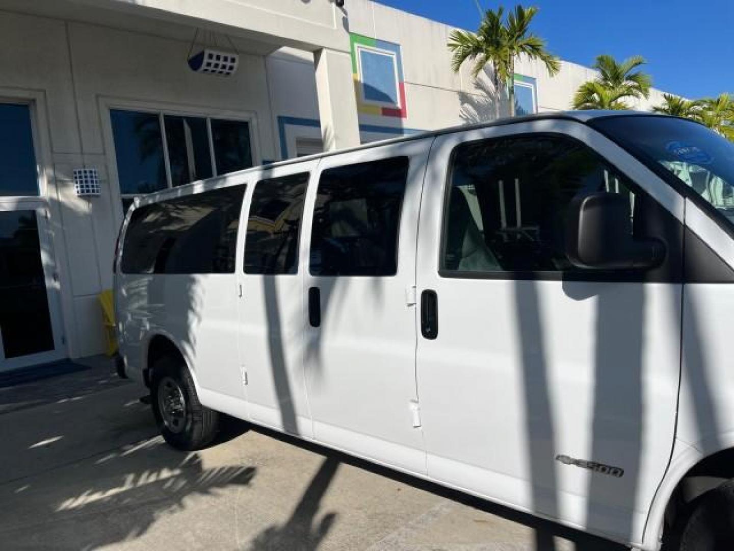 2003 Summit White /Neutral Chevrolet Express Passenger 15 LOW MILES 69,483 (1GAHG39U731) with an 6.0L Vortec 6000 V8 SFI Engine engine, Automatic transmission, located at 4701 North Dixie Hwy, Pompano Beach, FL, 33064, (954) 422-2889, 26.240938, -80.123474 - OUR WEBPAGE FLORIDACARS1.COM HAS OVER 100 PHOTOS AND FREE CARFAX LINK 2003 CHEVROLET EXPRESS 3500 ROAD READY WORK READY VIN: 1GAHG39U731131035 NO RECALLS 6.0L V8 VAN FLORIDA OWNER 6.0L V8 F LOW MILES 69,483 GASOLINE 15 PASSENGER REAR WHEEL DRIVE POWER MIRRORS Front Bucket Seats RWD Rear Air Conditio - Photo#71