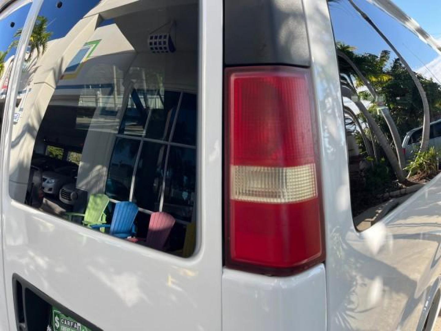 2003 Summit White /Neutral Chevrolet Express Passenger 15 LOW MILES 69,483 (1GAHG39U731) with an 6.0L Vortec 6000 V8 SFI Engine engine, Automatic transmission, located at 4701 North Dixie Hwy, Pompano Beach, FL, 33064, (954) 422-2889, 26.240938, -80.123474 - OUR WEBPAGE FLORIDACARS1.COM HAS OVER 100 PHOTOS AND FREE CARFAX LINK 2003 CHEVROLET EXPRESS 3500 ROAD READY WORK READY VIN: 1GAHG39U731131035 NO RECALLS 6.0L V8 VAN FLORIDA OWNER 6.0L V8 F LOW MILES 69,483 GASOLINE 15 PASSENGER REAR WHEEL DRIVE POWER MIRRORS Front Bucket Seats RWD Rear Air Conditio - Photo#81