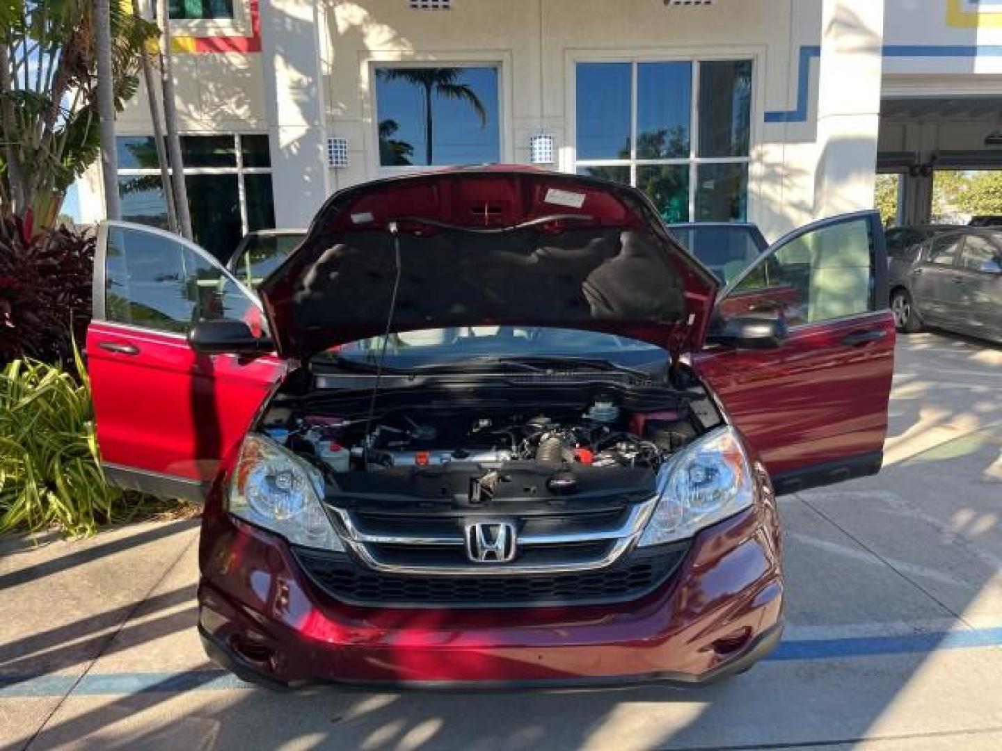 2010 Tango Red Pearl /Gray Honda CR-V 1 FL LX 35,357 (5J6RE3H33AL) with an 2.4L DOHC MPFI 16-Valve i-VTEC I4 Engine engine, Automatic transmission, located at 4701 North Dixie Hwy, Pompano Beach, FL, 33064, (954) 422-2889, 26.240938, -80.123474 - OUR WEBPAGE FLORIDACARS1.COM HAS OVER 100 PHOTOS AND FREE CARFAX LINK 2010 HONDA CR-V LX ROAD READY 2,4L I4 VIN: 5J6RE3H33AL014736 NO RECALLS 28 MPG 4 DOOR WAGON/SPORT UTILITY 1 OWNER FLORIDA 2.4L I4 F DOHC 16V LOW MILES 35,357 GASOLINE 21 SERVICE RECORDS FRONT WHEEL DRIVE POWER MIRRORS Active Head - Photo#16