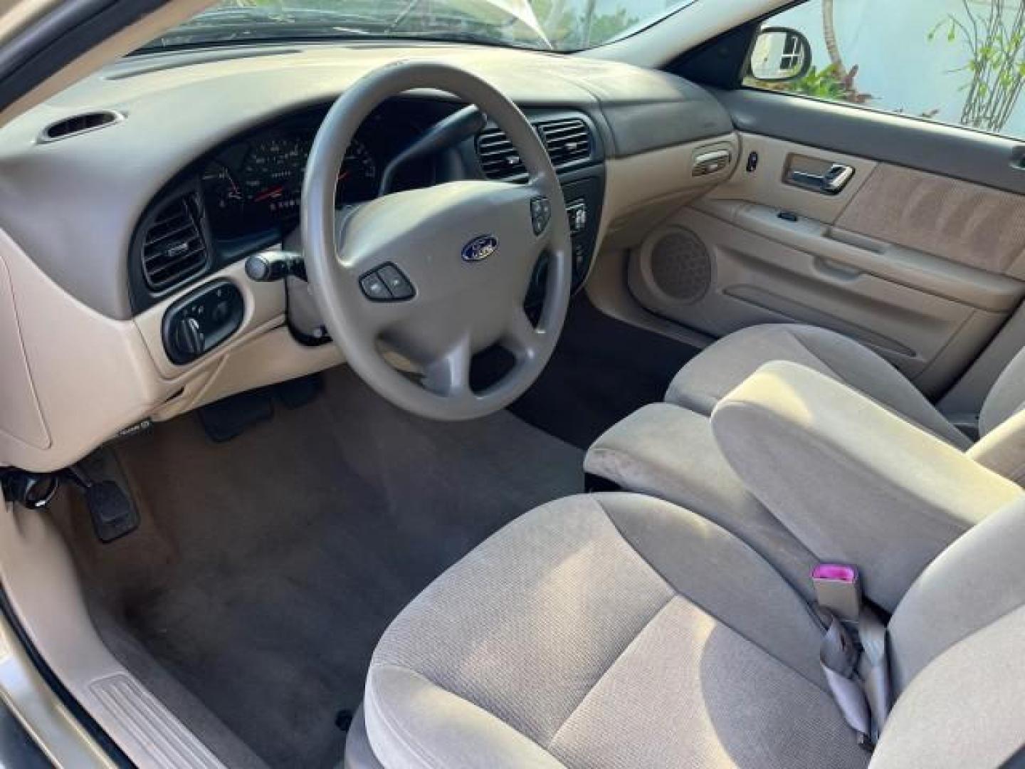 2001 Harvest Gold Metallic /Medium Graphite Ford Taurus SES LOW MILES 47,338 (1FAFP55U81A) with an 3.0L SOHC SMPI 12-Valve V6 Vulcan Engine engine, Automatic transmission, located at 4701 North Dixie Hwy, Pompano Beach, FL, 33064, (954) 422-2889, 26.240938, -80.123474 - OUR WEBPAGE FLORIDACARS1.COM HAS OVER 100 PHOTOS AND FREE CARFAX LINK 2001 FORD TAURUS SES ROAD READY 3.0L V6 VIN: 1FAFP55U81A102713 FLORIDA OWNER 27 MPG SEDAN 4 DR LOW MILES 47,338 3.0L V6 F OHV POWER SEATS POWER MIRRORS GASOLINE NO ACCIDENTS FRONT WHEEL DRIVE Alloy Wheels Anti-Theft System Approac - Photo#45