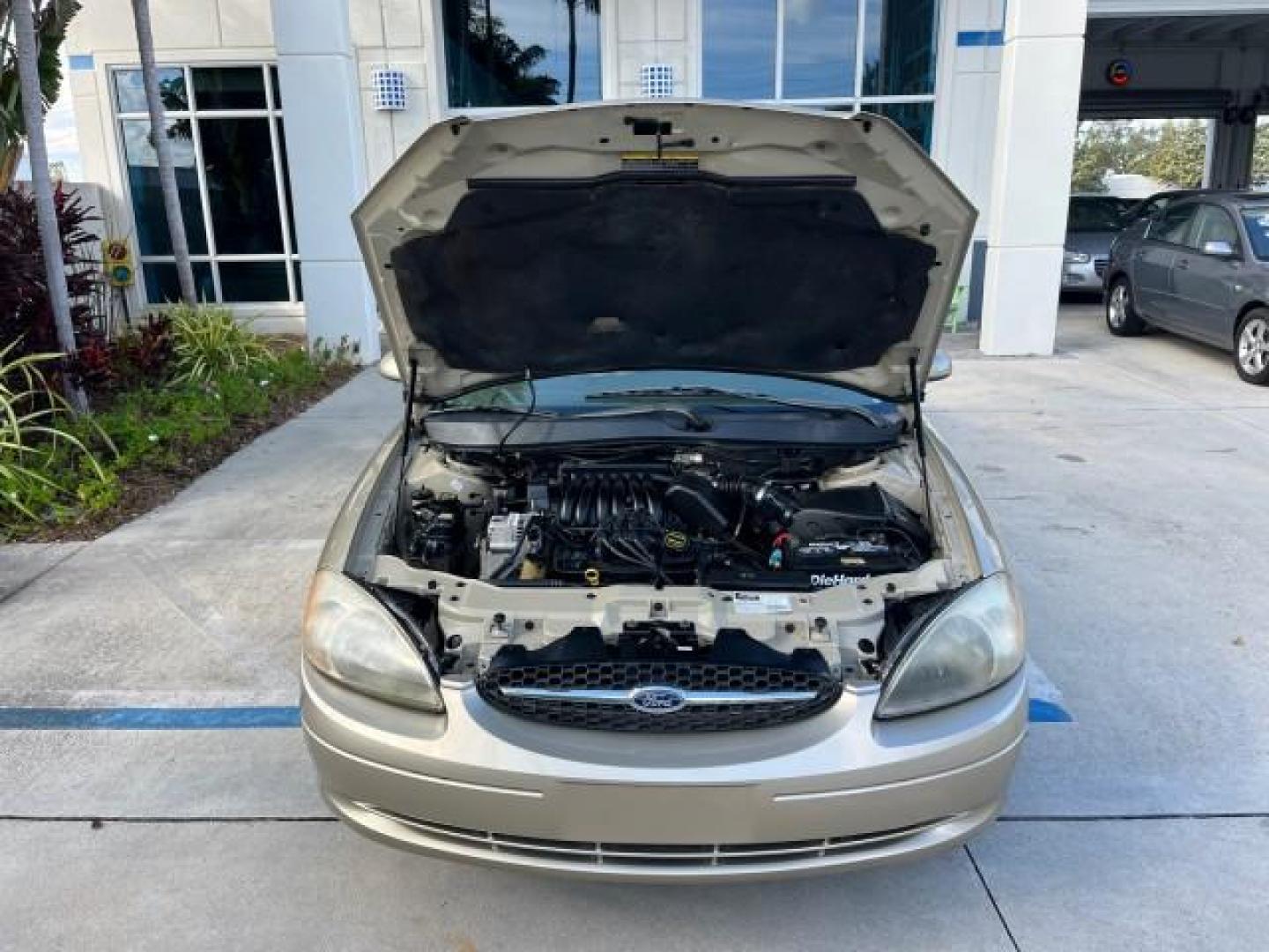 2001 Harvest Gold Metallic /Medium Graphite Ford Taurus SES LOW MILES 47,338 (1FAFP55U81A) with an 3.0L SOHC SMPI 12-Valve V6 Vulcan Engine engine, Automatic transmission, located at 4701 North Dixie Hwy, Pompano Beach, FL, 33064, (954) 422-2889, 26.240938, -80.123474 - OUR WEBPAGE FLORIDACARS1.COM HAS OVER 100 PHOTOS AND FREE CARFAX LINK 2001 FORD TAURUS SES ROAD READY 3.0L V6 VIN: 1FAFP55U81A102713 FLORIDA OWNER 27 MPG SEDAN 4 DR LOW MILES 47,338 3.0L V6 F OHV POWER SEATS POWER MIRRORS GASOLINE NO ACCIDENTS FRONT WHEEL DRIVE Alloy Wheels Anti-Theft System Approac - Photo#59