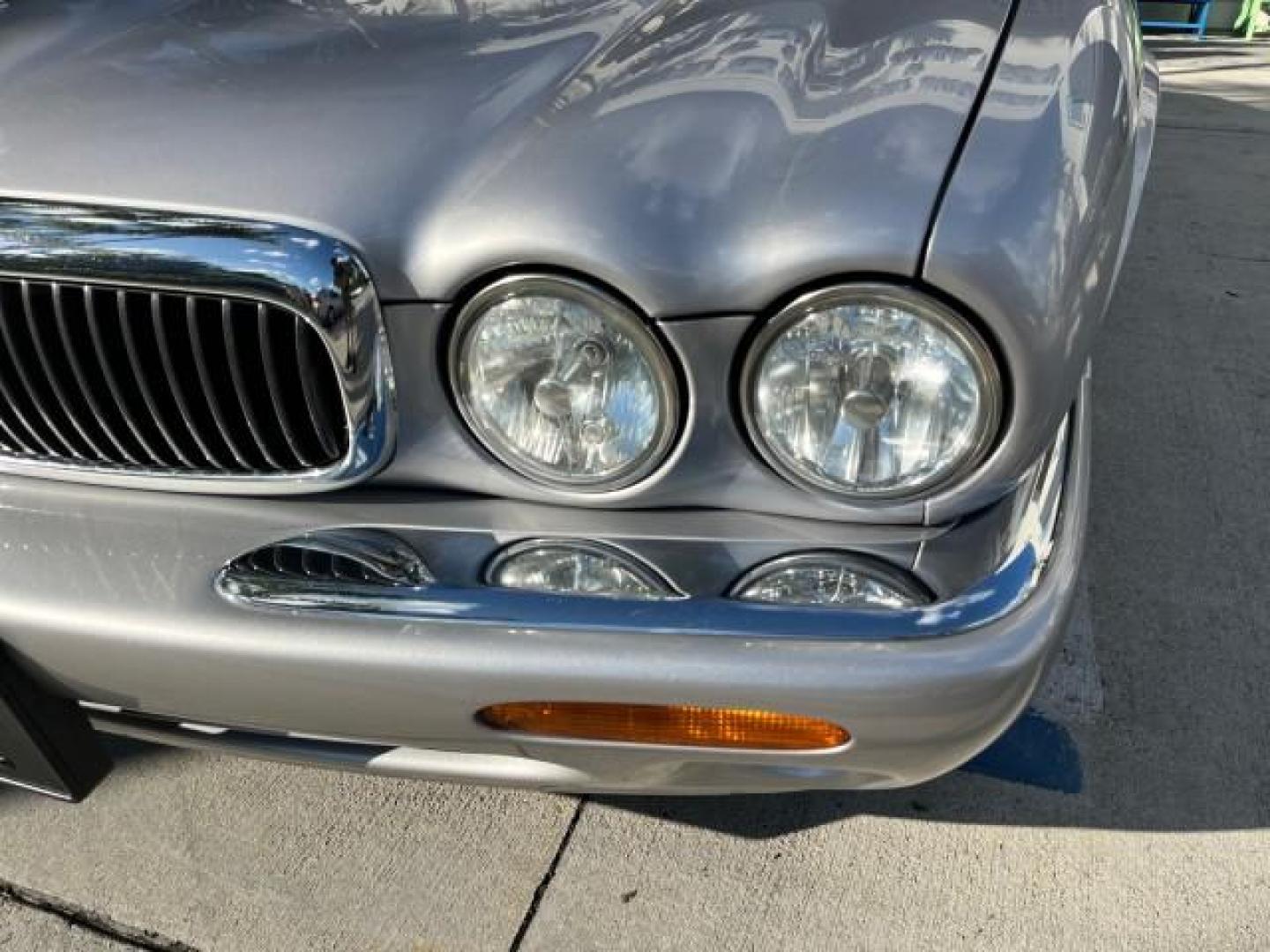 2001 Platinum Silver /Oatmeal Jaguar XJ 4.0 V8 LOW MILES 74,241 (SAJDA14C61L) with an 4.0L DOHC SPFI 32-Valve Aluminum Alloy V8 Engine engine, Automatic transmission, located at 4701 North Dixie Hwy, Pompano Beach, FL, 33064, (954) 422-2889, 26.240938, -80.123474 - OUR WEBPAGE FLORIDACARS1.COM HAS OVER 100 PHOTOS AND FREE CARFAX LINK 2001 JAGUAR XJ-SERIES XJ8 NEW $56,855 ROAD READY 4.0L V8 VIN: SAJDA14C61LF39784 1 OWNER POWER SUNROOF SEDAN 4 DR POWER LEATHER SEATS 4.0L V8 F DOHC 32V PARKING SENSORS GASOLINE NO ACCIDENTS NO RECALLS REAR WHEEL DRIVE 47 SERVICE R - Photo#81