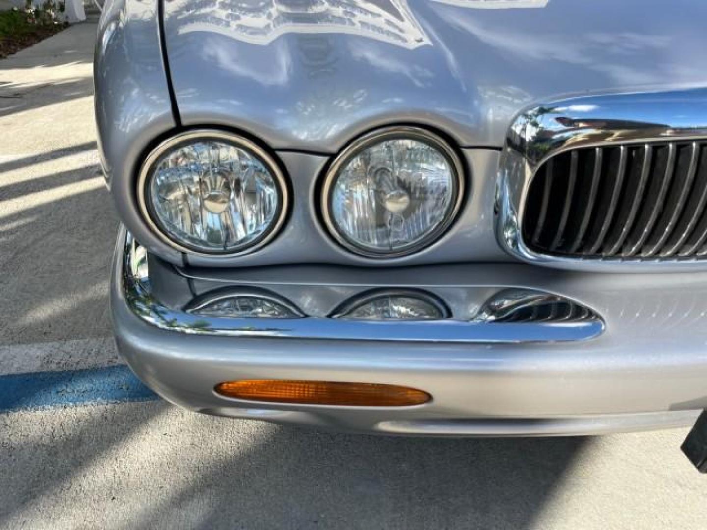 2001 Platinum Silver /Oatmeal Jaguar XJ 4.0 V8 LOW MILES 74,241 (SAJDA14C61L) with an 4.0L DOHC SPFI 32-Valve Aluminum Alloy V8 Engine engine, Automatic transmission, located at 4701 North Dixie Hwy, Pompano Beach, FL, 33064, (954) 422-2889, 26.240938, -80.123474 - OUR WEBPAGE FLORIDACARS1.COM HAS OVER 100 PHOTOS AND FREE CARFAX LINK 2001 JAGUAR XJ-SERIES XJ8 NEW $56,855 ROAD READY 4.0L V8 VIN: SAJDA14C61LF39784 1 OWNER POWER SUNROOF SEDAN 4 DR POWER LEATHER SEATS 4.0L V8 F DOHC 32V PARKING SENSORS GASOLINE NO ACCIDENTS NO RECALLS REAR WHEEL DRIVE 47 SERVICE R - Photo#82