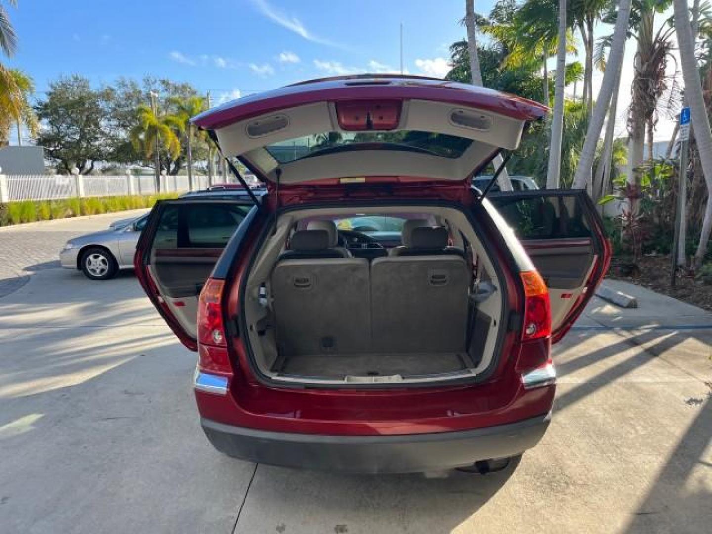 2005 Inferno Red Crystal Pearl /Light Taupe Chrysler Pacifica Touring LOW MILES 67,198 (2C4GM684X5R) with an 3.5L MPI 24-Valve V6 Engine engine, Automatic transmission, located at 4701 North Dixie Hwy, Pompano Beach, FL, 33064, (954) 422-2889, 26.240938, -80.123474 - OUR WEBPAGE FLORIDACARS1.COM HAS OVER 100 PHOTOS AND FREE CARFAX LINK 2005 CHRYSLER PACIFICA TOURING ROAD READY 3.5L V6 VIN: 2C4GM684X5R648035 NO ACCIDENTS 4 DOOR WAGON/SPORT UTILITY NO RECALLS DVD 3.5L V6 F 24V FLORIDA OWNER GASOLINE POWER LIFTGATE LOW MILES 67,198 FRONT WHEEL DRIVE 3 ROW SEATS POW - Photo#15