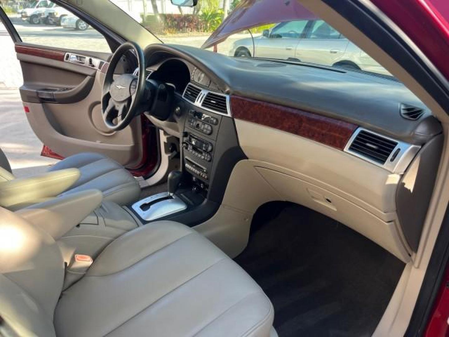 2005 Inferno Red Crystal Pearl /Light Taupe Chrysler Pacifica Touring LOW MILES 67,198 (2C4GM684X5R) with an 3.5L MPI 24-Valve V6 Engine engine, Automatic transmission, located at 4701 North Dixie Hwy, Pompano Beach, FL, 33064, (954) 422-2889, 26.240938, -80.123474 - OUR WEBPAGE FLORIDACARS1.COM HAS OVER 100 PHOTOS AND FREE CARFAX LINK 2005 CHRYSLER PACIFICA TOURING ROAD READY 3.5L V6 VIN: 2C4GM684X5R648035 NO ACCIDENTS 4 DOOR WAGON/SPORT UTILITY NO RECALLS DVD 3.5L V6 F 24V FLORIDA OWNER GASOLINE POWER LIFTGATE LOW MILES 67,198 FRONT WHEEL DRIVE 3 ROW SEATS POW - Photo#27