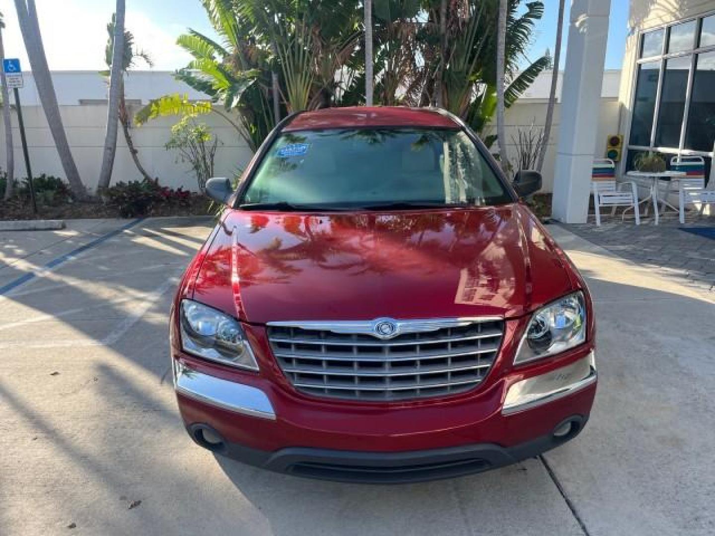 2005 Inferno Red Crystal Pearl /Light Taupe Chrysler Pacifica Touring LOW MILES 67,198 (2C4GM684X5R) with an 3.5L MPI 24-Valve V6 Engine engine, Automatic transmission, located at 4701 North Dixie Hwy, Pompano Beach, FL, 33064, (954) 422-2889, 26.240938, -80.123474 - OUR WEBPAGE FLORIDACARS1.COM HAS OVER 100 PHOTOS AND FREE CARFAX LINK 2005 CHRYSLER PACIFICA TOURING ROAD READY 3.5L V6 VIN: 2C4GM684X5R648035 NO ACCIDENTS 4 DOOR WAGON/SPORT UTILITY NO RECALLS DVD 3.5L V6 F 24V FLORIDA OWNER GASOLINE POWER LIFTGATE LOW MILES 67,198 FRONT WHEEL DRIVE 3 ROW SEATS POW - Photo#2