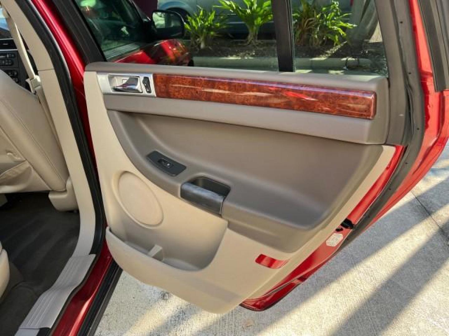 2005 Inferno Red Crystal Pearl /Light Taupe Chrysler Pacifica Touring LOW MILES 67,198 (2C4GM684X5R) with an 3.5L MPI 24-Valve V6 Engine engine, Automatic transmission, located at 4701 North Dixie Hwy, Pompano Beach, FL, 33064, (954) 422-2889, 26.240938, -80.123474 - OUR WEBPAGE FLORIDACARS1.COM HAS OVER 100 PHOTOS AND FREE CARFAX LINK 2005 CHRYSLER PACIFICA TOURING ROAD READY 3.5L V6 VIN: 2C4GM684X5R648035 NO ACCIDENTS 4 DOOR WAGON/SPORT UTILITY NO RECALLS DVD 3.5L V6 F 24V FLORIDA OWNER GASOLINE POWER LIFTGATE LOW MILES 67,198 FRONT WHEEL DRIVE 3 ROW SEATS POW - Photo#29