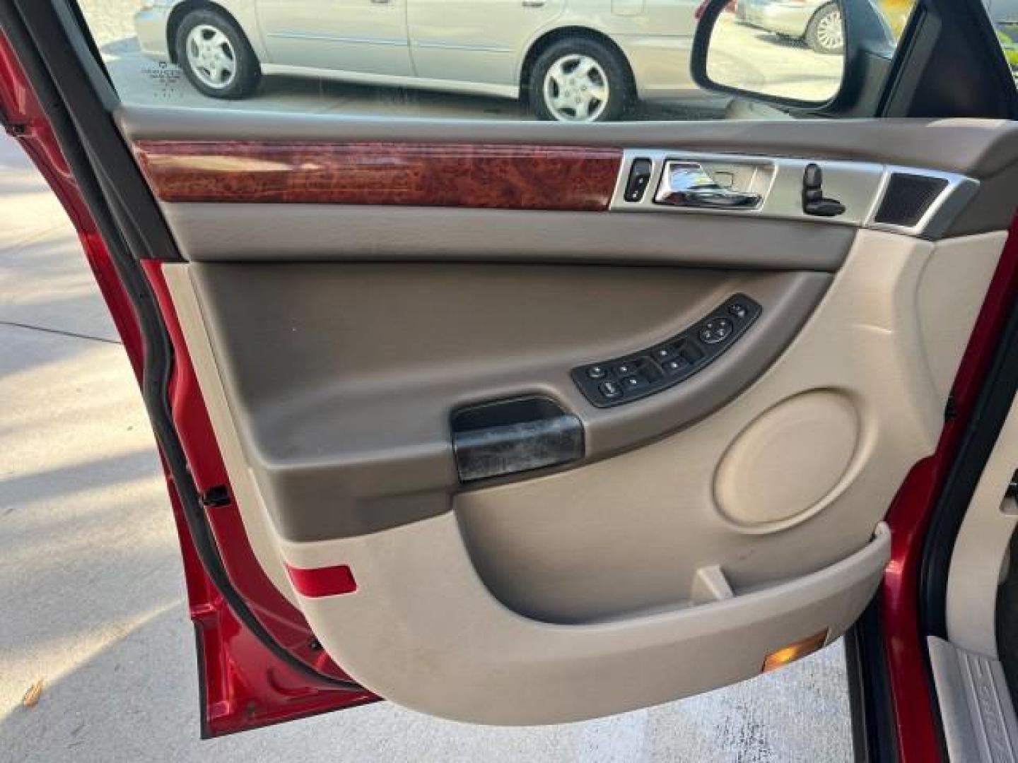 2005 Inferno Red Crystal Pearl /Light Taupe Chrysler Pacifica Touring LOW MILES 67,198 (2C4GM684X5R) with an 3.5L MPI 24-Valve V6 Engine engine, Automatic transmission, located at 4701 North Dixie Hwy, Pompano Beach, FL, 33064, (954) 422-2889, 26.240938, -80.123474 - OUR WEBPAGE FLORIDACARS1.COM HAS OVER 100 PHOTOS AND FREE CARFAX LINK 2005 CHRYSLER PACIFICA TOURING ROAD READY 3.5L V6 VIN: 2C4GM684X5R648035 NO ACCIDENTS 4 DOOR WAGON/SPORT UTILITY NO RECALLS DVD 3.5L V6 F 24V FLORIDA OWNER GASOLINE POWER LIFTGATE LOW MILES 67,198 FRONT WHEEL DRIVE 3 ROW SEATS POW - Photo#45