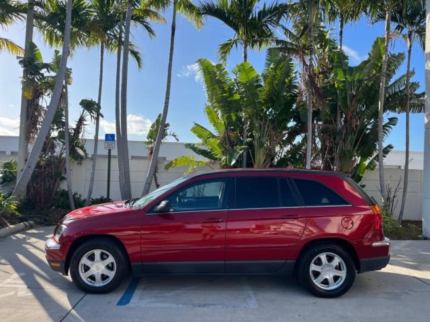 2005 Inferno Red Crystal Pearl /Light Taupe Chrysler Pacifica Touring LOW MILES 67,198 (2C4GM684X5R) with an 3.5L MPI 24-Valve V6 Engine engine, Automatic transmission, located at 4701 North Dixie Hwy, Pompano Beach, FL, 33064, (954) 422-2889, 26.240938, -80.123474 - OUR WEBPAGE FLORIDACARS1.COM HAS OVER 100 PHOTOS AND FREE CARFAX LINK 2005 CHRYSLER PACIFICA TOURING ROAD READY 3.5L V6 VIN: 2C4GM684X5R648035 NO ACCIDENTS 4 DOOR WAGON/SPORT UTILITY NO RECALLS DVD 3.5L V6 F 24V FLORIDA OWNER GASOLINE POWER LIFTGATE LOW MILES 67,198 FRONT WHEEL DRIVE 3 ROW SEATS POW - Photo#4