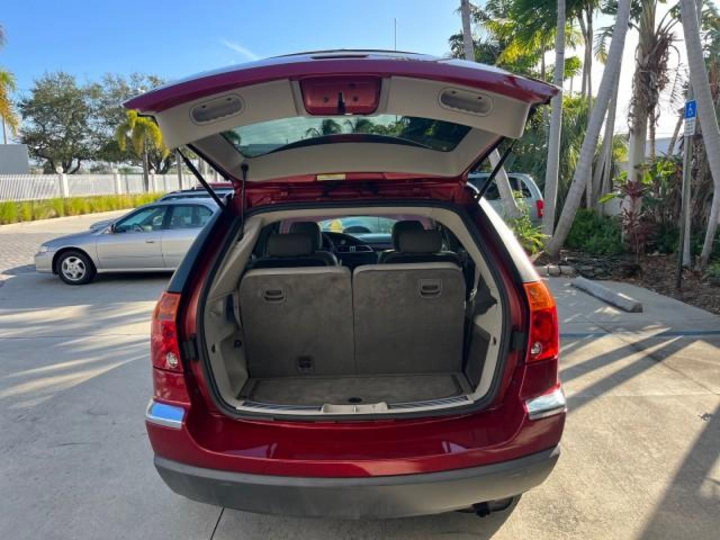 2005 Inferno Red Crystal Pearl /Light Taupe Chrysler Pacifica Touring LOW MILES 67,198 (2C4GM684X5R) with an 3.5L MPI 24-Valve V6 Engine engine, Automatic transmission, located at 4701 North Dixie Hwy, Pompano Beach, FL, 33064, (954) 422-2889, 26.240938, -80.123474 - OUR WEBPAGE FLORIDACARS1.COM HAS OVER 100 PHOTOS AND FREE CARFAX LINK 2005 CHRYSLER PACIFICA TOURING ROAD READY 3.5L V6 VIN: 2C4GM684X5R648035 NO ACCIDENTS 4 DOOR WAGON/SPORT UTILITY NO RECALLS DVD 3.5L V6 F 24V FLORIDA OWNER GASOLINE POWER LIFTGATE LOW MILES 67,198 FRONT WHEEL DRIVE 3 ROW SEATS POW - Photo#64