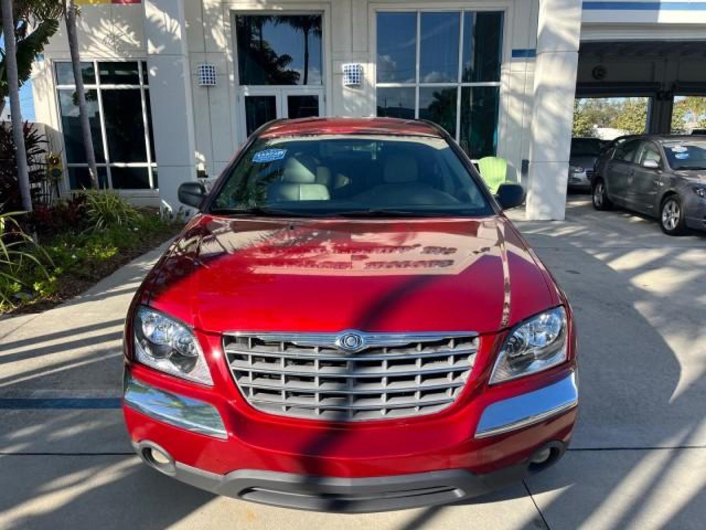 2005 Inferno Red Crystal Pearl /Light Taupe Chrysler Pacifica Touring LOW MILES 67,198 (2C4GM684X5R) with an 3.5L MPI 24-Valve V6 Engine engine, Automatic transmission, located at 4701 North Dixie Hwy, Pompano Beach, FL, 33064, (954) 422-2889, 26.240938, -80.123474 - OUR WEBPAGE FLORIDACARS1.COM HAS OVER 100 PHOTOS AND FREE CARFAX LINK 2005 CHRYSLER PACIFICA TOURING ROAD READY 3.5L V6 VIN: 2C4GM684X5R648035 NO ACCIDENTS 4 DOOR WAGON/SPORT UTILITY NO RECALLS DVD 3.5L V6 F 24V FLORIDA OWNER GASOLINE POWER LIFTGATE LOW MILES 67,198 FRONT WHEEL DRIVE 3 ROW SEATS POW - Photo#76