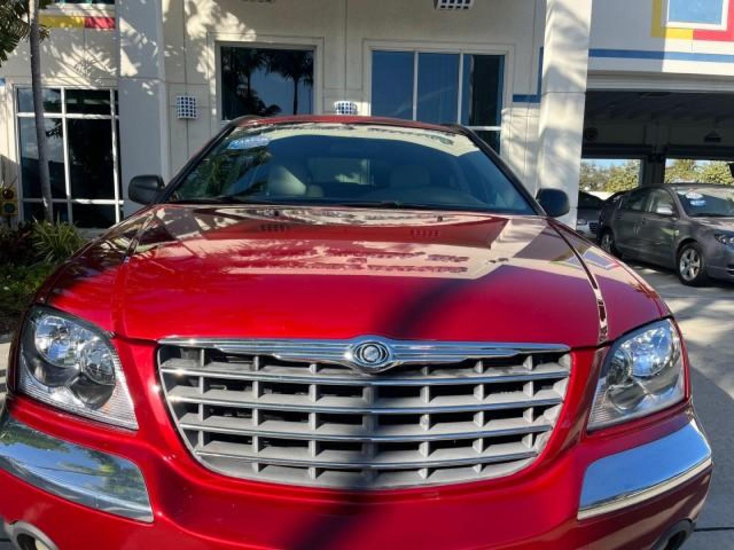 2005 Inferno Red Crystal Pearl /Light Taupe Chrysler Pacifica Touring LOW MILES 67,198 (2C4GM684X5R) with an 3.5L MPI 24-Valve V6 Engine engine, Automatic transmission, located at 4701 North Dixie Hwy, Pompano Beach, FL, 33064, (954) 422-2889, 26.240938, -80.123474 - OUR WEBPAGE FLORIDACARS1.COM HAS OVER 100 PHOTOS AND FREE CARFAX LINK 2005 CHRYSLER PACIFICA TOURING ROAD READY 3.5L V6 VIN: 2C4GM684X5R648035 NO ACCIDENTS 4 DOOR WAGON/SPORT UTILITY NO RECALLS DVD 3.5L V6 F 24V FLORIDA OWNER GASOLINE POWER LIFTGATE LOW MILES 67,198 FRONT WHEEL DRIVE 3 ROW SEATS POW - Photo#83