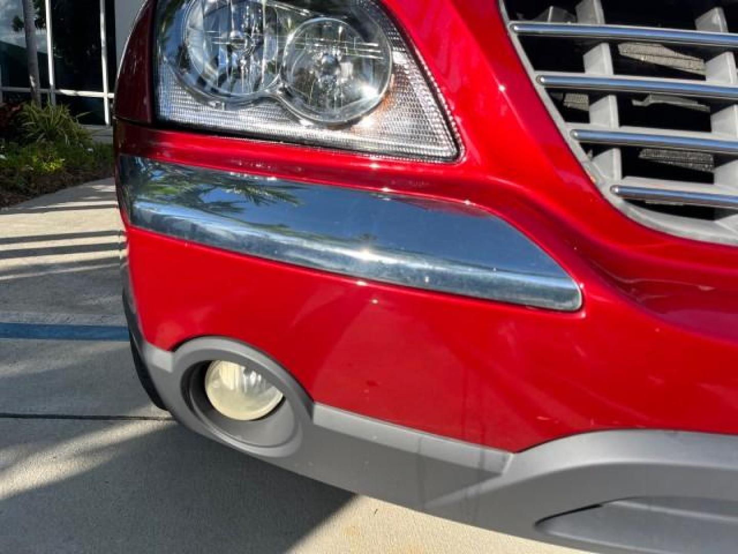 2005 Inferno Red Crystal Pearl /Light Taupe Chrysler Pacifica Touring LOW MILES 67,198 (2C4GM684X5R) with an 3.5L MPI 24-Valve V6 Engine engine, Automatic transmission, located at 4701 North Dixie Hwy, Pompano Beach, FL, 33064, (954) 422-2889, 26.240938, -80.123474 - OUR WEBPAGE FLORIDACARS1.COM HAS OVER 100 PHOTOS AND FREE CARFAX LINK 2005 CHRYSLER PACIFICA TOURING ROAD READY 3.5L V6 VIN: 2C4GM684X5R648035 NO ACCIDENTS 4 DOOR WAGON/SPORT UTILITY NO RECALLS DVD 3.5L V6 F 24V FLORIDA OWNER GASOLINE POWER LIFTGATE LOW MILES 67,198 FRONT WHEEL DRIVE 3 ROW SEATS POW - Photo#84