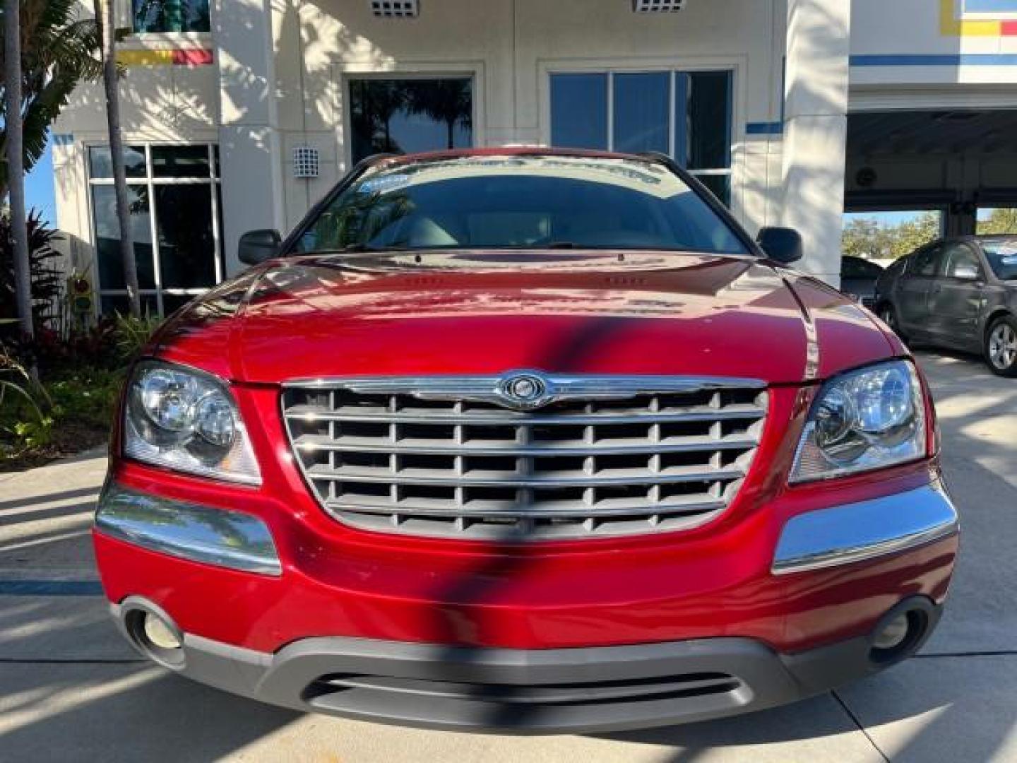 2005 Inferno Red Crystal Pearl /Light Taupe Chrysler Pacifica Touring LOW MILES 67,198 (2C4GM684X5R) with an 3.5L MPI 24-Valve V6 Engine engine, Automatic transmission, located at 4701 North Dixie Hwy, Pompano Beach, FL, 33064, (954) 422-2889, 26.240938, -80.123474 - OUR WEBPAGE FLORIDACARS1.COM HAS OVER 100 PHOTOS AND FREE CARFAX LINK 2005 CHRYSLER PACIFICA TOURING ROAD READY 3.5L V6 VIN: 2C4GM684X5R648035 NO ACCIDENTS 4 DOOR WAGON/SPORT UTILITY NO RECALLS DVD 3.5L V6 F 24V FLORIDA OWNER GASOLINE POWER LIFTGATE LOW MILES 67,198 FRONT WHEEL DRIVE 3 ROW SEATS POW - Photo#86