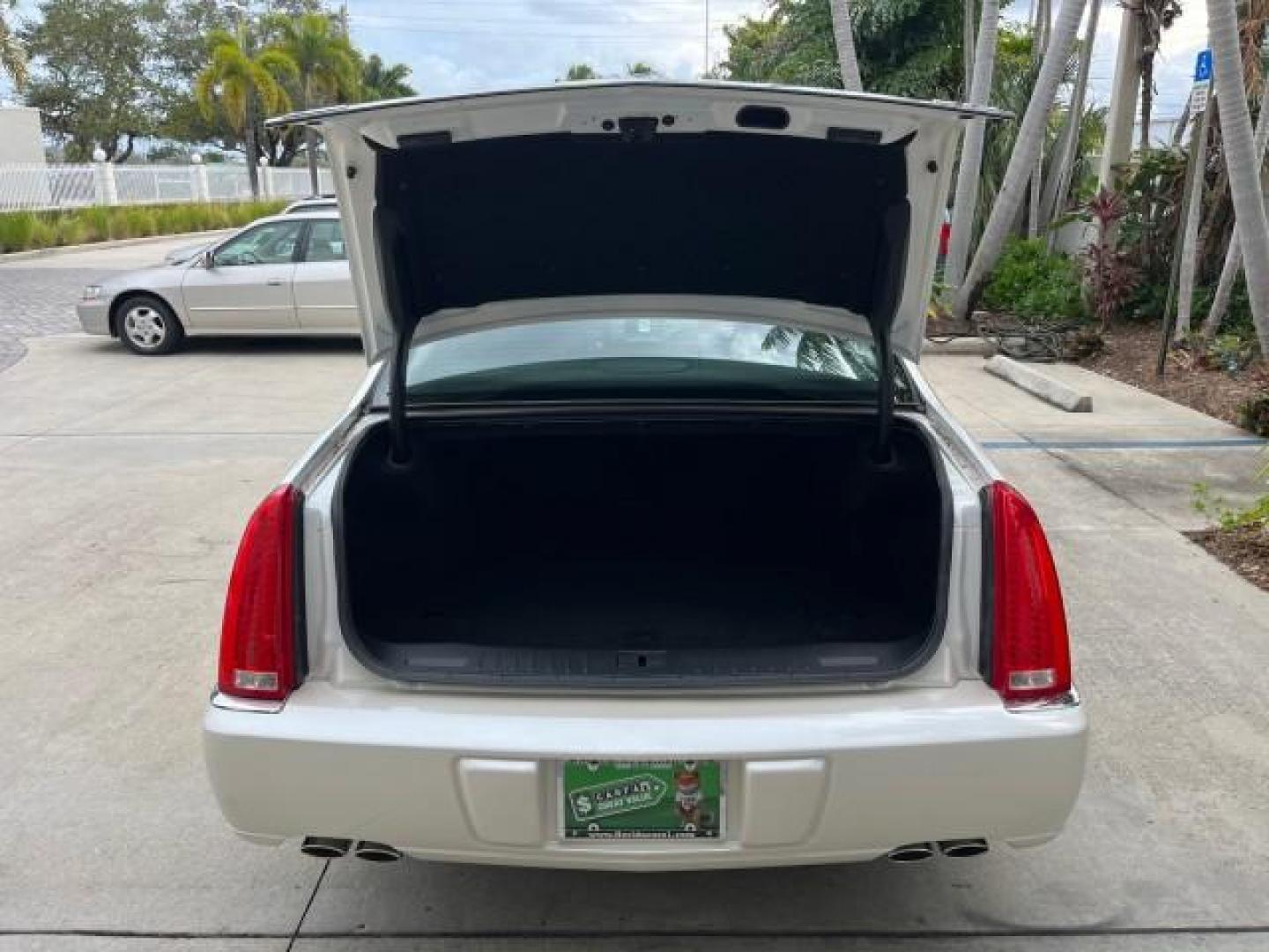 2010 White Diamond Tricoat /Ebony Cadillac DTS VERY LOW MILES 24,026 (1G6KA5EY1AU) with an Northstar 4.6L DOHC V8 Engine engine, Automatic transmission, located at 4701 North Dixie Hwy, Pompano Beach, FL, 33064, (954) 422-2889, 26.240938, -80.123474 - OUR WEBPAGE FLORIDACARS1.COM HAS OVER 100 PHOTOS AND FREE CARFAX LINK 2010 CADILLAC DTS 4.6L V8 NEW $49,245 ROAD READY 4.6L V8 VIN: 1G6KA5EY1AU108528 NO ACCIDENTS SEDAN 4 DR NO RECALLS DUAL AC 4.6L V8 F DOHC 32V POWER LEATHER SEATS GASOLINE SUPER LOW MILES 24,026 FRONT WHEEL DRIVE 30 SERVICE RECORDS - Photo#60