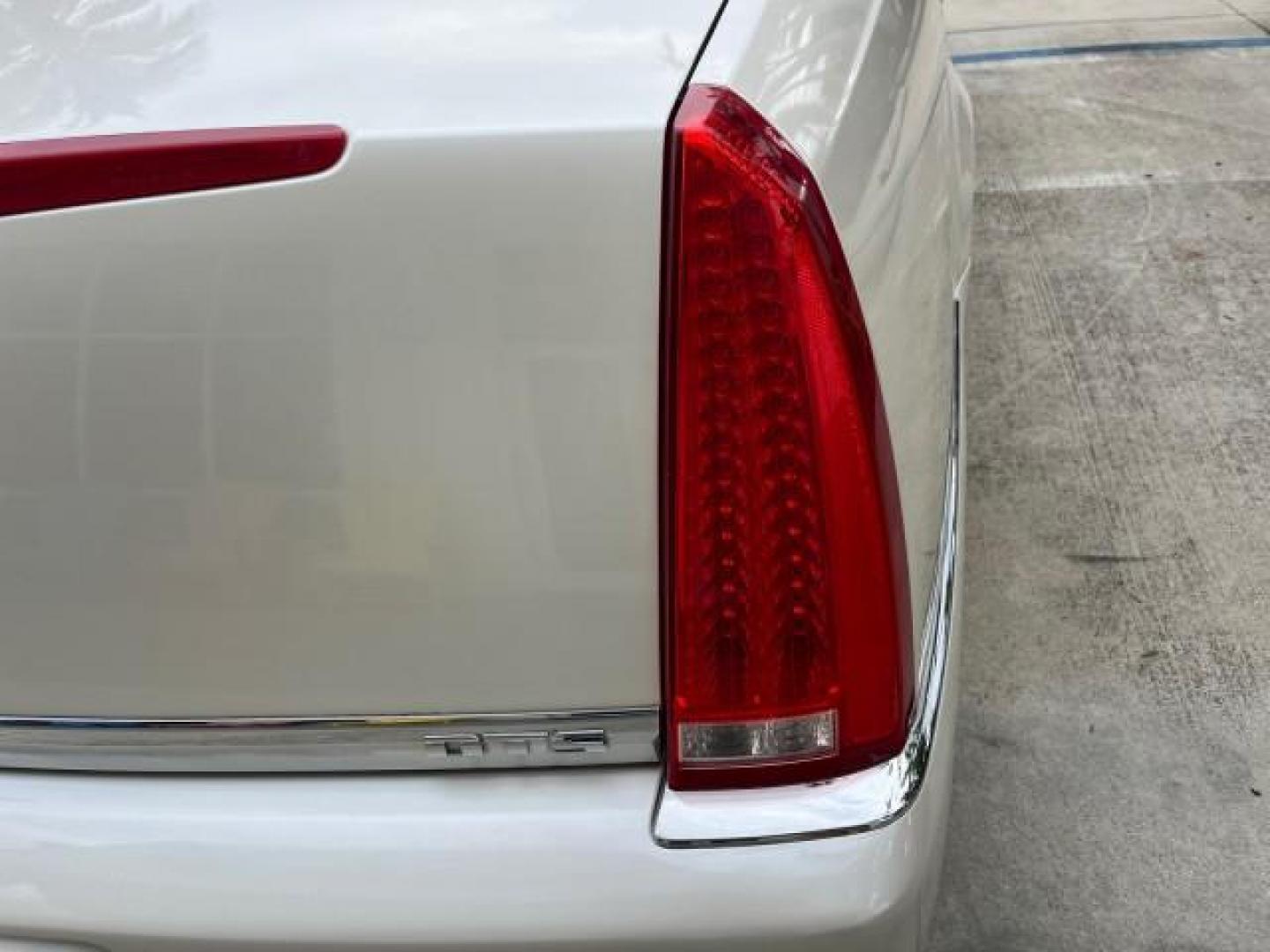 2010 White Diamond Tricoat /Ebony Cadillac DTS VERY LOW MILES 24,026 (1G6KA5EY1AU) with an Northstar 4.6L DOHC V8 Engine engine, Automatic transmission, located at 4701 North Dixie Hwy, Pompano Beach, FL, 33064, (954) 422-2889, 26.240938, -80.123474 - OUR WEBPAGE FLORIDACARS1.COM HAS OVER 100 PHOTOS AND FREE CARFAX LINK 2010 CADILLAC DTS 4.6L V8 NEW $49,245 ROAD READY 4.6L V8 VIN: 1G6KA5EY1AU108528 NO ACCIDENTS SEDAN 4 DR NO RECALLS DUAL AC 4.6L V8 F DOHC 32V POWER LEATHER SEATS GASOLINE SUPER LOW MILES 24,026 FRONT WHEEL DRIVE 30 SERVICE RECORDS - Photo#95