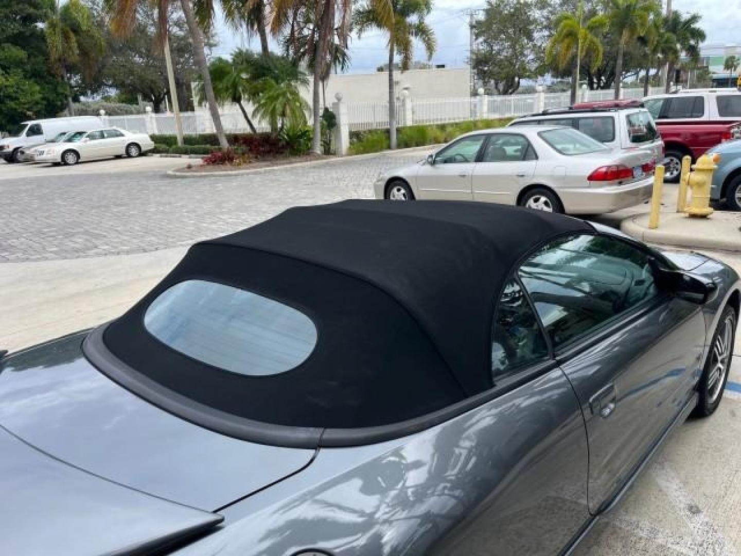 2004 Titanium Pearl /Midnight Mitsubishi Eclipse 1 FL GTS LOW MILES 36,082 (4A3AE75H84E) with an 3.0L SOHC MPFI 24-Valve V6 Variable Induction Engine engine, Automatic transmission, located at 4701 North Dixie Hwy, Pompano Beach, FL, 33064, (954) 422-2889, 26.240938, -80.123474 - OUR WEBPAGE FLORIDACARS1.COM HAS OVER 100 PHOTOS AND FREE CARFAX LINK 2004 MITSUBISHI ECLIPSE SPYDER GTS ROAD READY 3.0L V6 VIN: 4A3AE75H84E116730 NO ACCIDENTS 29 MPG CONVERTIBLE NO RECALLS 1 OWNER 3.0L V6 F DOHC 24V LOW MILES 30,082 GTS GASOLINE POWER CONVERTIBLE TOP POWER LEATHER SEATS FRONT WHEEL - Photo#83