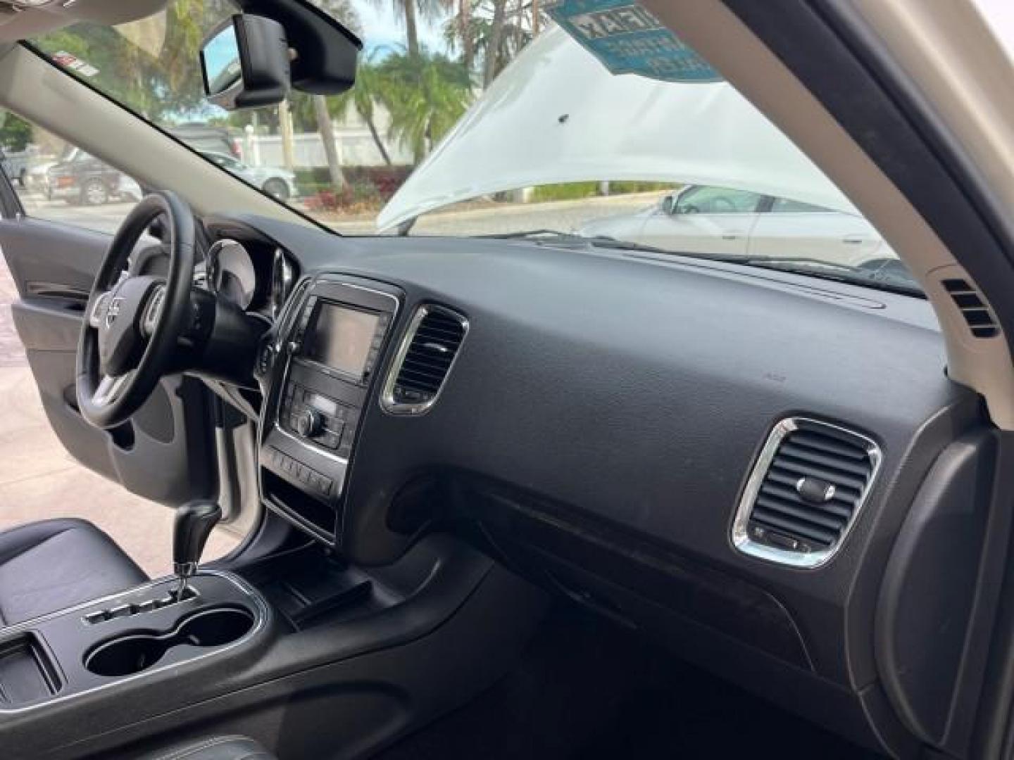 2011 Stone White /Black Dodge Durango Citadel V 8 HEMI LOW MILES 64,436 (1D4SD5GT5BC) with an 5.7L V8 VVT Hemi Multi Displacement Engine engine, Automatic transmission, located at 4701 North Dixie Hwy, Pompano Beach, FL, 33064, (954) 422-2889, 26.240938, -80.123474 - OUR WEBPAGE FLORIDACARS1.COM HAS OVER 100 PHOTOS AND FREE CARFAX LINK 2011 DODGE DURANGO CITADEL ROAD READY 5.7L V8 DVD VIN: 1D4SD5GT5BC694943 NO RECALLS FLORIDA OWNER 4 DOOR WAGON/SPORT UTILITY 3 ROW POWER LEATHER SEATS 5.7L V8 F OHV 16V PUSH START NAVIGATION POWER SUNROOF GASOLINE NEW $ 45,820 BAC - Photo#26