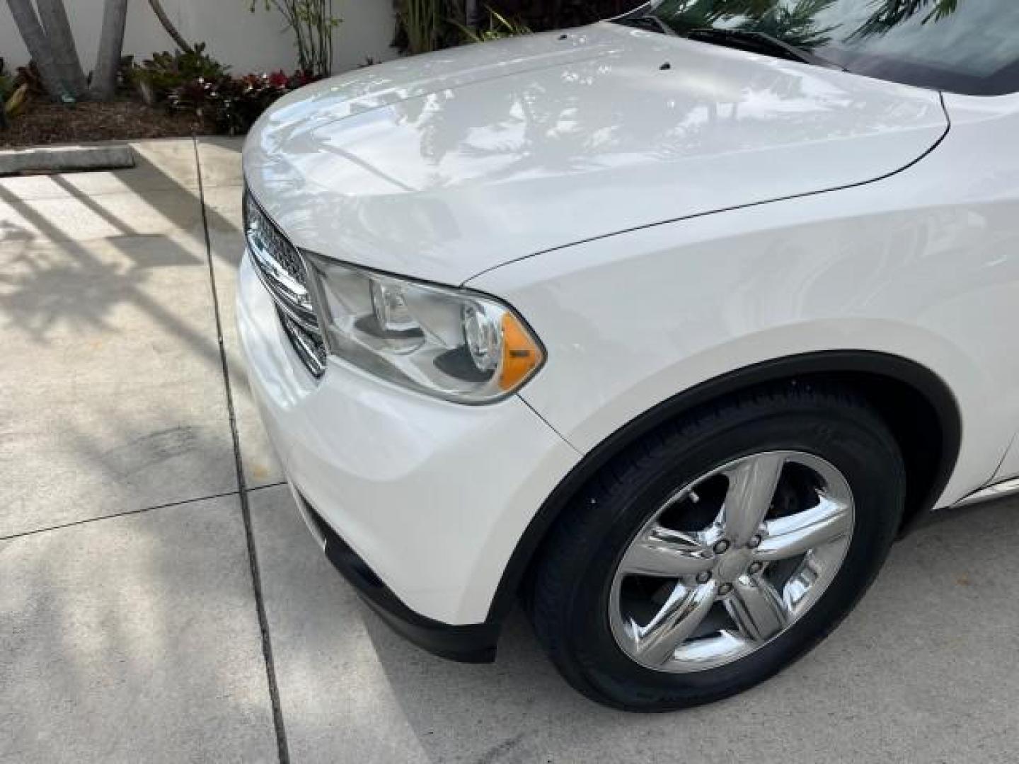 2011 Stone White /Black Dodge Durango Citadel V 8 HEMI LOW MILES 64,436 (1D4SD5GT5BC) with an 5.7L V8 VVT Hemi Multi Displacement Engine engine, Automatic transmission, located at 4701 North Dixie Hwy, Pompano Beach, FL, 33064, (954) 422-2889, 26.240938, -80.123474 - OUR WEBPAGE FLORIDACARS1.COM HAS OVER 100 PHOTOS AND FREE CARFAX LINK 2011 DODGE DURANGO CITADEL ROAD READY 5.7L V8 DVD VIN: 1D4SD5GT5BC694943 NO RECALLS FLORIDA OWNER 4 DOOR WAGON/SPORT UTILITY 3 ROW POWER LEATHER SEATS 5.7L V8 F OHV 16V PUSH START NAVIGATION POWER SUNROOF GASOLINE NEW $ 45,820 BAC - Photo#95