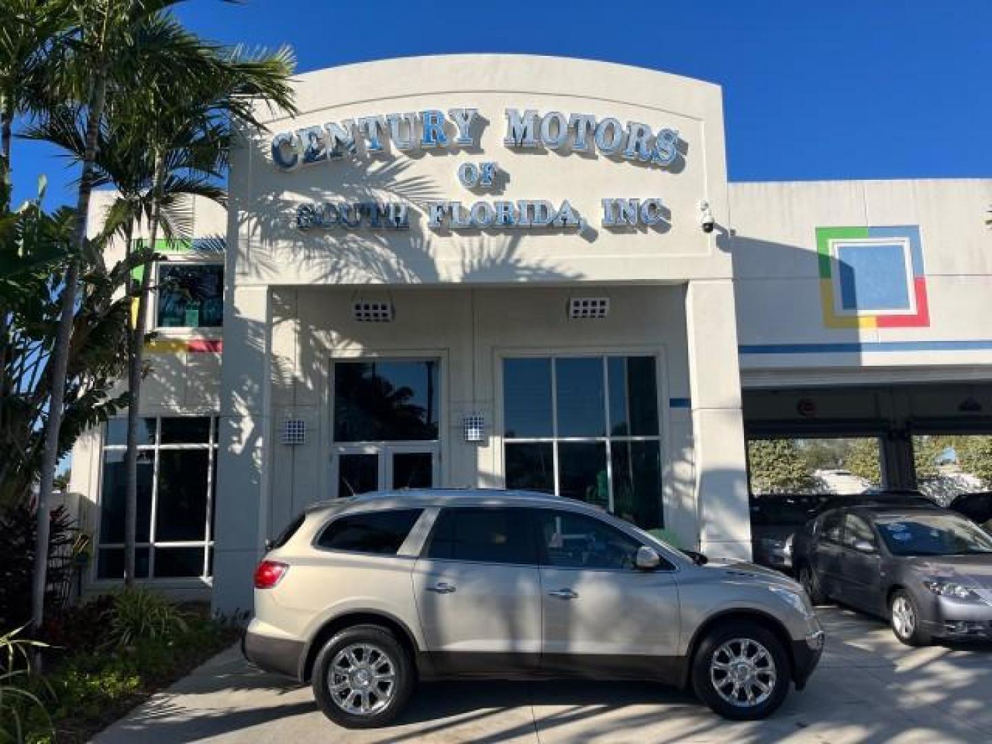 2011 Gold Mist Metallic /Cashmere With Cocoa Accents Buick Enclave 1 FL CXL-1 LOW MILES 64,303 (5GAKRBEDXBJ) with an 3.6L VVT V6 DI Engine engine, Automatic transmission, located at 4701 North Dixie Hwy, Pompano Beach, FL, 33064, (954) 422-2889, 26.240938, -80.123474 - OUR WEBPAGE FLORIDACARS1.COM HAS OVER 100 PHOTOS AND FREE CARFAX LINK 2011 BUICK ENCLAVE CXL-1 ROAD READY 3.6L V6 DUAL AC VIN: 5GAKRBEDXBJ409689 NO ACCIDENTS NO RECALLS 4 DOOR WAGON/SPORT UTILITY 1 OWNER FLORIDA NAVIGATION 3.6L V6 F DOHC 24V 3 ROW POWER LEATHER SEATS GASOLINE BACK UP CAMERA AND SENS - Photo#0