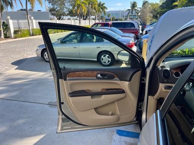 2011 Gold Mist Metallic /Cashmere With Cocoa Accents Buick Enclave 1 FL CXL-1 LOW MILES 64,303 (5GAKRBEDXBJ) with an 3.6L VVT V6 DI Engine engine, Automatic transmission, located at 4701 North Dixie Hwy, Pompano Beach, FL, 33064, (954) 422-2889, 26.240938, -80.123474 - OUR WEBPAGE FLORIDACARS1.COM HAS OVER 100 PHOTOS AND FREE CARFAX LINK 2011 BUICK ENCLAVE CXL-1 ROAD READY 3.6L V6 DUAL AC VIN: 5GAKRBEDXBJ409689 NO ACCIDENTS NO RECALLS 4 DOOR WAGON/SPORT UTILITY 1 OWNER FLORIDA NAVIGATION 3.6L V6 F DOHC 24V 3 ROW POWER LEATHER SEATS GASOLINE BACK UP CAMERA AND SENS - Photo#9