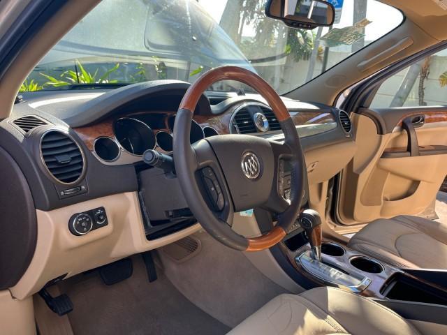 2011 Gold Mist Metallic /Cashmere With Cocoa Accents Buick Enclave 1 FL CXL-1 LOW MILES 64,303 (5GAKRBEDXBJ) with an 3.6L VVT V6 DI Engine engine, Automatic transmission, located at 4701 North Dixie Hwy, Pompano Beach, FL, 33064, (954) 422-2889, 26.240938, -80.123474 - OUR WEBPAGE FLORIDACARS1.COM HAS OVER 100 PHOTOS AND FREE CARFAX LINK 2011 BUICK ENCLAVE CXL-1 ROAD READY 3.6L V6 DUAL AC VIN: 5GAKRBEDXBJ409689 NO ACCIDENTS NO RECALLS 4 DOOR WAGON/SPORT UTILITY 1 OWNER FLORIDA NAVIGATION 3.6L V6 F DOHC 24V 3 ROW POWER LEATHER SEATS GASOLINE BACK UP CAMERA AND SENS - Photo#10