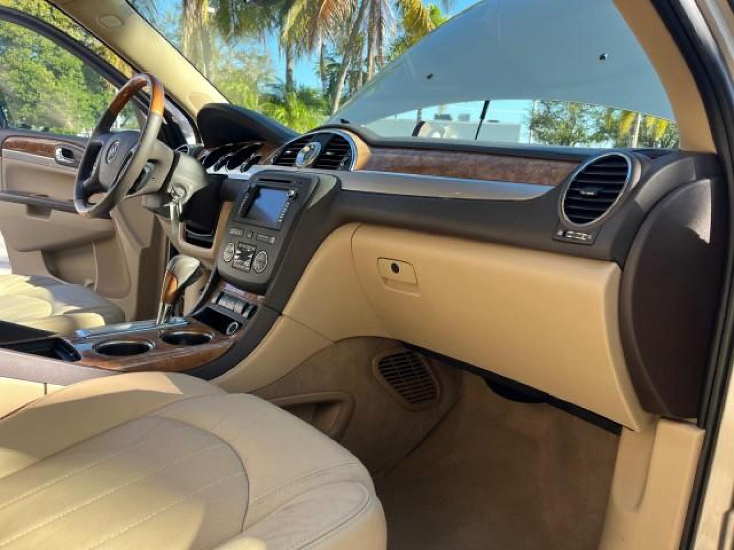 2011 Gold Mist Metallic /Cashmere With Cocoa Accents Buick Enclave 1 FL CXL-1 LOW MILES 64,303 (5GAKRBEDXBJ) with an 3.6L VVT V6 DI Engine engine, Automatic transmission, located at 4701 North Dixie Hwy, Pompano Beach, FL, 33064, (954) 422-2889, 26.240938, -80.123474 - OUR WEBPAGE FLORIDACARS1.COM HAS OVER 100 PHOTOS AND FREE CARFAX LINK 2011 BUICK ENCLAVE CXL-1 ROAD READY 3.6L V6 DUAL AC VIN: 5GAKRBEDXBJ409689 NO ACCIDENTS NO RECALLS 4 DOOR WAGON/SPORT UTILITY 1 OWNER FLORIDA NAVIGATION 3.6L V6 F DOHC 24V 3 ROW POWER LEATHER SEATS GASOLINE BACK UP CAMERA AND SENS - Photo#12