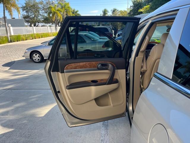 2011 Gold Mist Metallic /Cashmere With Cocoa Accents Buick Enclave 1 FL CXL-1 LOW MILES 64,303 (5GAKRBEDXBJ) with an 3.6L VVT V6 DI Engine engine, Automatic transmission, located at 4701 North Dixie Hwy, Pompano Beach, FL, 33064, (954) 422-2889, 26.240938, -80.123474 - OUR WEBPAGE FLORIDACARS1.COM HAS OVER 100 PHOTOS AND FREE CARFAX LINK 2011 BUICK ENCLAVE CXL-1 ROAD READY 3.6L V6 DUAL AC VIN: 5GAKRBEDXBJ409689 NO ACCIDENTS NO RECALLS 4 DOOR WAGON/SPORT UTILITY 1 OWNER FLORIDA NAVIGATION 3.6L V6 F DOHC 24V 3 ROW POWER LEATHER SEATS GASOLINE BACK UP CAMERA AND SENS - Photo#13