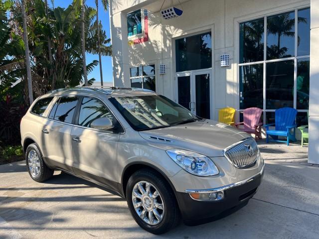2011 Gold Mist Metallic /Cashmere With Cocoa Accents Buick Enclave 1 FL CXL-1 LOW MILES 64,303 (5GAKRBEDXBJ) with an 3.6L VVT V6 DI Engine engine, Automatic transmission, located at 4701 North Dixie Hwy, Pompano Beach, FL, 33064, (954) 422-2889, 26.240938, -80.123474 - OUR WEBPAGE FLORIDACARS1.COM HAS OVER 100 PHOTOS AND FREE CARFAX LINK 2011 BUICK ENCLAVE CXL-1 ROAD READY 3.6L V6 DUAL AC VIN: 5GAKRBEDXBJ409689 NO ACCIDENTS NO RECALLS 4 DOOR WAGON/SPORT UTILITY 1 OWNER FLORIDA NAVIGATION 3.6L V6 F DOHC 24V 3 ROW POWER LEATHER SEATS GASOLINE BACK UP CAMERA AND SENS - Photo#1
