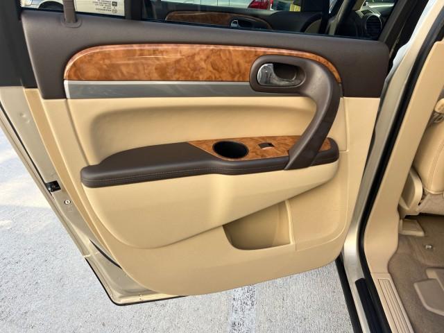 2011 Gold Mist Metallic /Cashmere With Cocoa Accents Buick Enclave 1 FL CXL-1 LOW MILES 64,303 (5GAKRBEDXBJ) with an 3.6L VVT V6 DI Engine engine, Automatic transmission, located at 4701 North Dixie Hwy, Pompano Beach, FL, 33064, (954) 422-2889, 26.240938, -80.123474 - OUR WEBPAGE FLORIDACARS1.COM HAS OVER 100 PHOTOS AND FREE CARFAX LINK 2011 BUICK ENCLAVE CXL-1 ROAD READY 3.6L V6 DUAL AC VIN: 5GAKRBEDXBJ409689 NO ACCIDENTS NO RECALLS 4 DOOR WAGON/SPORT UTILITY 1 OWNER FLORIDA NAVIGATION 3.6L V6 F DOHC 24V 3 ROW POWER LEATHER SEATS GASOLINE BACK UP CAMERA AND SENS - Photo#41