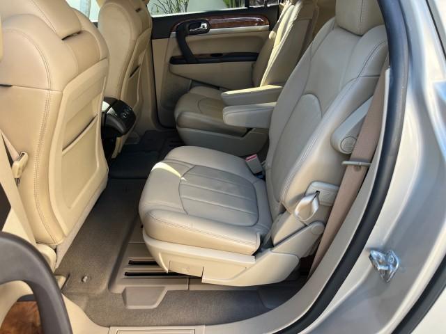 2011 Gold Mist Metallic /Cashmere With Cocoa Accents Buick Enclave 1 FL CXL-1 LOW MILES 64,303 (5GAKRBEDXBJ) with an 3.6L VVT V6 DI Engine engine, Automatic transmission, located at 4701 North Dixie Hwy, Pompano Beach, FL, 33064, (954) 422-2889, 26.240938, -80.123474 - OUR WEBPAGE FLORIDACARS1.COM HAS OVER 100 PHOTOS AND FREE CARFAX LINK 2011 BUICK ENCLAVE CXL-1 ROAD READY 3.6L V6 DUAL AC VIN: 5GAKRBEDXBJ409689 NO ACCIDENTS NO RECALLS 4 DOOR WAGON/SPORT UTILITY 1 OWNER FLORIDA NAVIGATION 3.6L V6 F DOHC 24V 3 ROW POWER LEATHER SEATS GASOLINE BACK UP CAMERA AND SENS - Photo#43