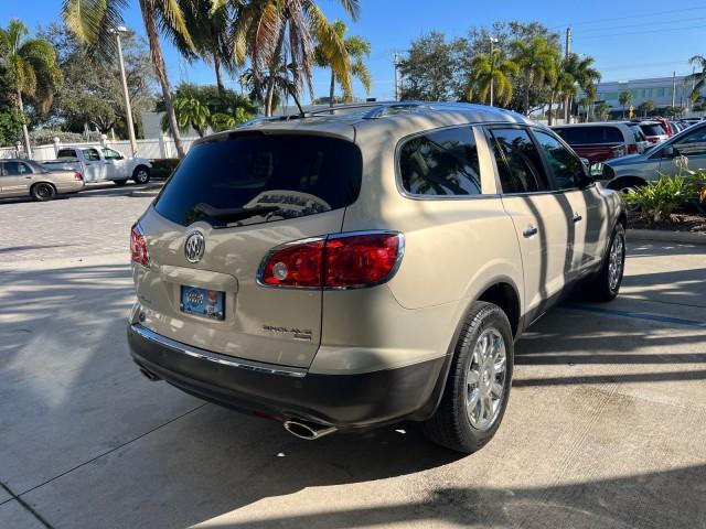 2011 Gold Mist Metallic /Cashmere With Cocoa Accents Buick Enclave 1 FL CXL-1 LOW MILES 64,303 (5GAKRBEDXBJ) with an 3.6L VVT V6 DI Engine engine, Automatic transmission, located at 4701 North Dixie Hwy, Pompano Beach, FL, 33064, (954) 422-2889, 26.240938, -80.123474 - OUR WEBPAGE FLORIDACARS1.COM HAS OVER 100 PHOTOS AND FREE CARFAX LINK 2011 BUICK ENCLAVE CXL-1 ROAD READY 3.6L V6 DUAL AC VIN: 5GAKRBEDXBJ409689 NO ACCIDENTS NO RECALLS 4 DOOR WAGON/SPORT UTILITY 1 OWNER FLORIDA NAVIGATION 3.6L V6 F DOHC 24V 3 ROW POWER LEATHER SEATS GASOLINE BACK UP CAMERA AND SENS - Photo#7