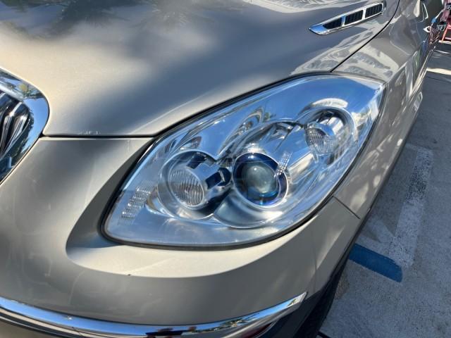 2011 Gold Mist Metallic /Cashmere With Cocoa Accents Buick Enclave 1 FL CXL-1 LOW MILES 64,303 (5GAKRBEDXBJ) with an 3.6L VVT V6 DI Engine engine, Automatic transmission, located at 4701 North Dixie Hwy, Pompano Beach, FL, 33064, (954) 422-2889, 26.240938, -80.123474 - OUR WEBPAGE FLORIDACARS1.COM HAS OVER 100 PHOTOS AND FREE CARFAX LINK 2011 BUICK ENCLAVE CXL-1 ROAD READY 3.6L V6 DUAL AC VIN: 5GAKRBEDXBJ409689 NO ACCIDENTS NO RECALLS 4 DOOR WAGON/SPORT UTILITY 1 OWNER FLORIDA NAVIGATION 3.6L V6 F DOHC 24V 3 ROW POWER LEATHER SEATS GASOLINE BACK UP CAMERA AND SENS - Photo#83