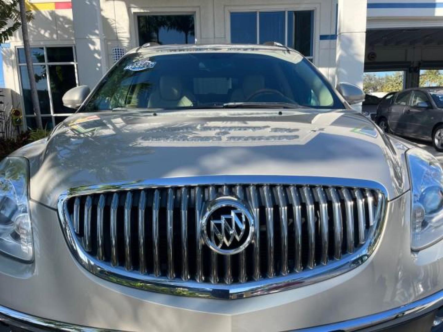 2011 Gold Mist Metallic /Cashmere With Cocoa Accents Buick Enclave 1 FL CXL-1 LOW MILES 64,303 (5GAKRBEDXBJ) with an 3.6L VVT V6 DI Engine engine, Automatic transmission, located at 4701 North Dixie Hwy, Pompano Beach, FL, 33064, (954) 422-2889, 26.240938, -80.123474 - OUR WEBPAGE FLORIDACARS1.COM HAS OVER 100 PHOTOS AND FREE CARFAX LINK 2011 BUICK ENCLAVE CXL-1 ROAD READY 3.6L V6 DUAL AC VIN: 5GAKRBEDXBJ409689 NO ACCIDENTS NO RECALLS 4 DOOR WAGON/SPORT UTILITY 1 OWNER FLORIDA NAVIGATION 3.6L V6 F DOHC 24V 3 ROW POWER LEATHER SEATS GASOLINE BACK UP CAMERA AND SENS - Photo#85