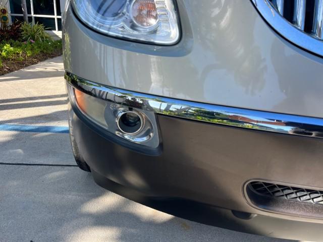 2011 Gold Mist Metallic /Cashmere With Cocoa Accents Buick Enclave 1 FL CXL-1 LOW MILES 64,303 (5GAKRBEDXBJ) with an 3.6L VVT V6 DI Engine engine, Automatic transmission, located at 4701 North Dixie Hwy, Pompano Beach, FL, 33064, (954) 422-2889, 26.240938, -80.123474 - OUR WEBPAGE FLORIDACARS1.COM HAS OVER 100 PHOTOS AND FREE CARFAX LINK 2011 BUICK ENCLAVE CXL-1 ROAD READY 3.6L V6 DUAL AC VIN: 5GAKRBEDXBJ409689 NO ACCIDENTS NO RECALLS 4 DOOR WAGON/SPORT UTILITY 1 OWNER FLORIDA NAVIGATION 3.6L V6 F DOHC 24V 3 ROW POWER LEATHER SEATS GASOLINE BACK UP CAMERA AND SENS - Photo#86