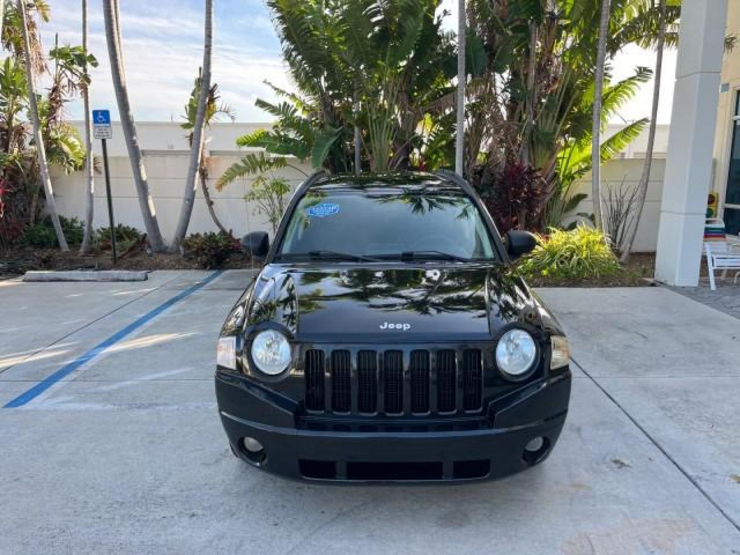 2008 Brilliant Blk Crystal Pearl /Dark Slate Gray Jeep Compass Sport LOW MILES 55,563 (1J8FT47W28D) with an 2.4L DOHC 16v I4 Dual VVT Engine engine, Automatic transmission, located at 4701 North Dixie Hwy, Pompano Beach, FL, 33064, (954) 422-2889, 26.240938, -80.123474 - OUR WEBPAGE FLORIDACARS1.COM HAS OVER 100 PHOTOS AND FREE CARFAX LINK 2008 JEEP COMPASS SPORT ROAD READY 2.4L I4 VIN: 1J8FT47W28D549845 NO ACCIDENTS 29 MPG 4 DOOR WAGON/SPORT UTILITY NO RECALLS 2.4L I4 F DOHC 16V FLORIDA OWNER GASOLINE LOW MILES 55,563 FRONT WHEEL DRIVE 9 SERVICE RECORDS Anti-Theft - Photo#2