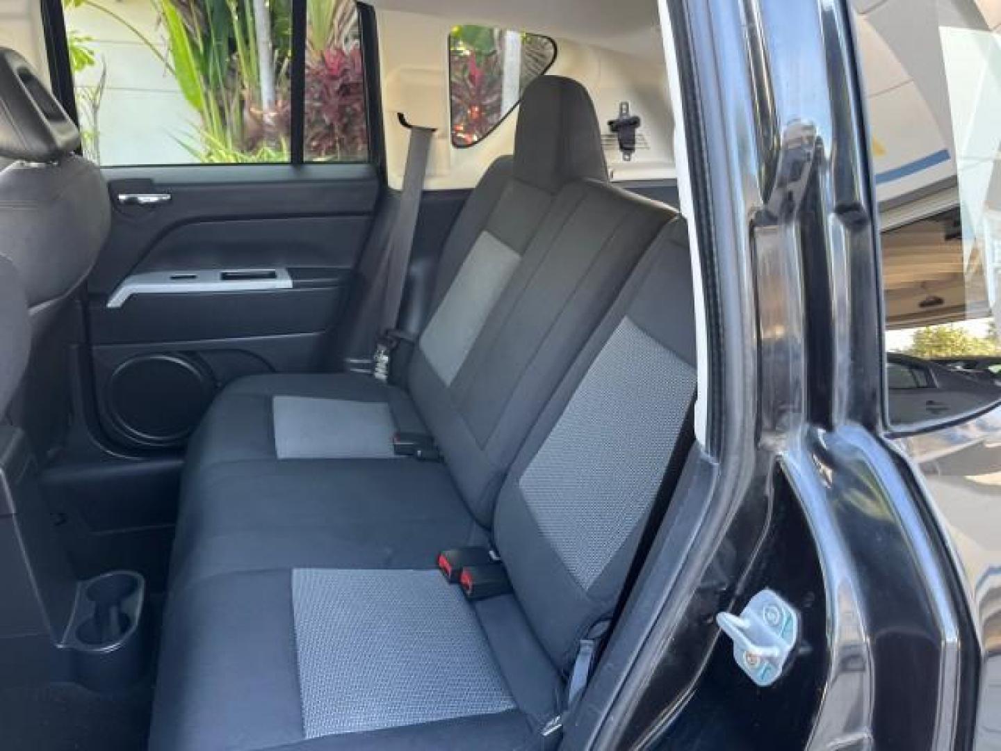 2008 Brilliant Blk Crystal Pearl /Dark Slate Gray Jeep Compass Sport LOW MILES 55,563 (1J8FT47W28D) with an 2.4L DOHC 16v I4 Dual VVT Engine engine, Automatic transmission, located at 4701 North Dixie Hwy, Pompano Beach, FL, 33064, (954) 422-2889, 26.240938, -80.123474 - OUR WEBPAGE FLORIDACARS1.COM HAS OVER 100 PHOTOS AND FREE CARFAX LINK 2008 JEEP COMPASS SPORT ROAD READY 2.4L I4 VIN: 1J8FT47W28D549845 NO ACCIDENTS 29 MPG 4 DOOR WAGON/SPORT UTILITY NO RECALLS 2.4L I4 F DOHC 16V FLORIDA OWNER GASOLINE LOW MILES 55,563 FRONT WHEEL DRIVE 9 SERVICE RECORDS Anti-Theft - Photo#39