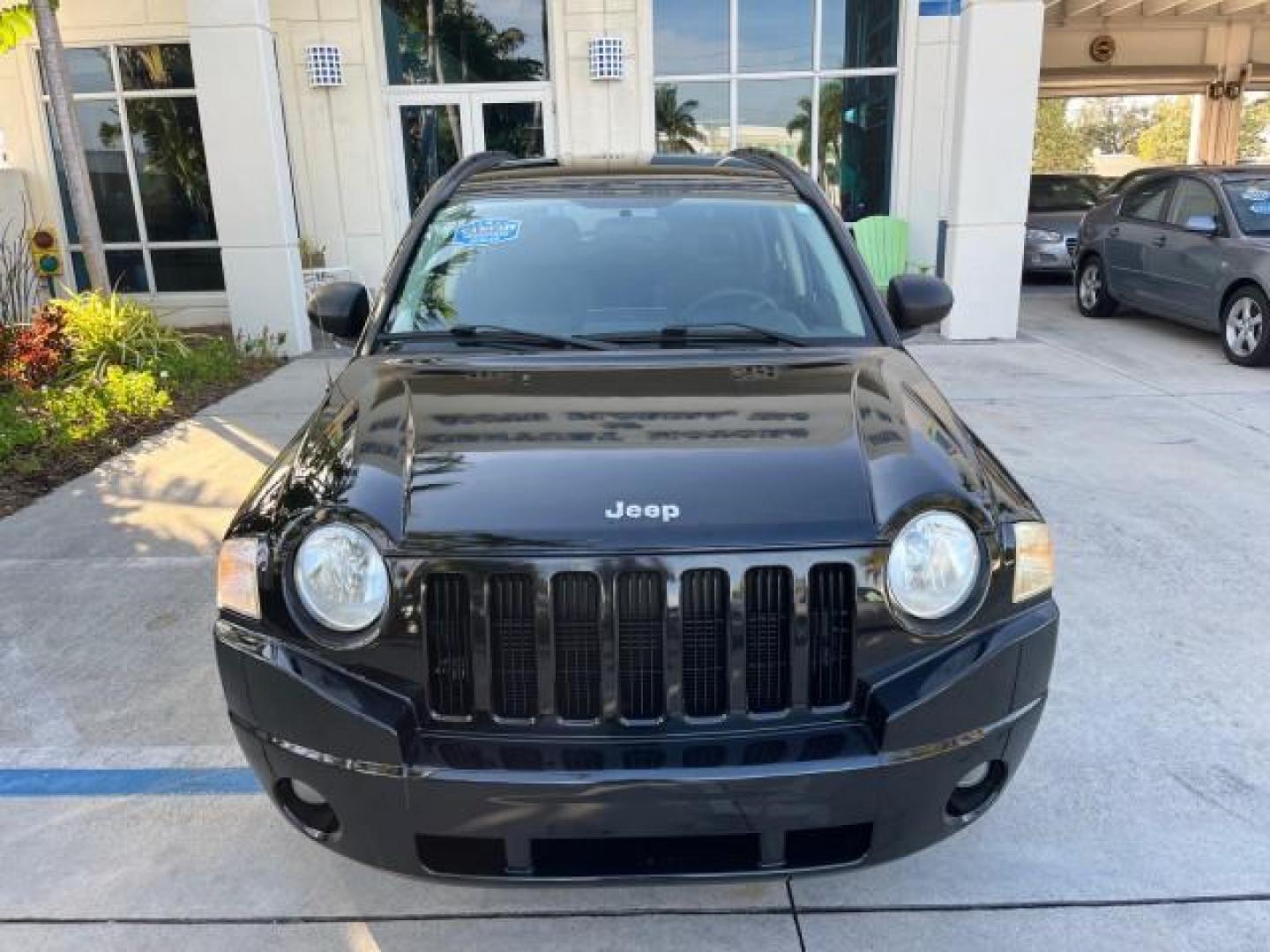 2008 Brilliant Blk Crystal Pearl /Dark Slate Gray Jeep Compass Sport LOW MILES 55,563 (1J8FT47W28D) with an 2.4L DOHC 16v I4 Dual VVT Engine engine, Automatic transmission, located at 4701 North Dixie Hwy, Pompano Beach, FL, 33064, (954) 422-2889, 26.240938, -80.123474 - OUR WEBPAGE FLORIDACARS1.COM HAS OVER 100 PHOTOS AND FREE CARFAX LINK 2008 JEEP COMPASS SPORT ROAD READY 2.4L I4 VIN: 1J8FT47W28D549845 NO ACCIDENTS 29 MPG 4 DOOR WAGON/SPORT UTILITY NO RECALLS 2.4L I4 F DOHC 16V FLORIDA OWNER GASOLINE LOW MILES 55,563 FRONT WHEEL DRIVE 9 SERVICE RECORDS Anti-Theft - Photo#71