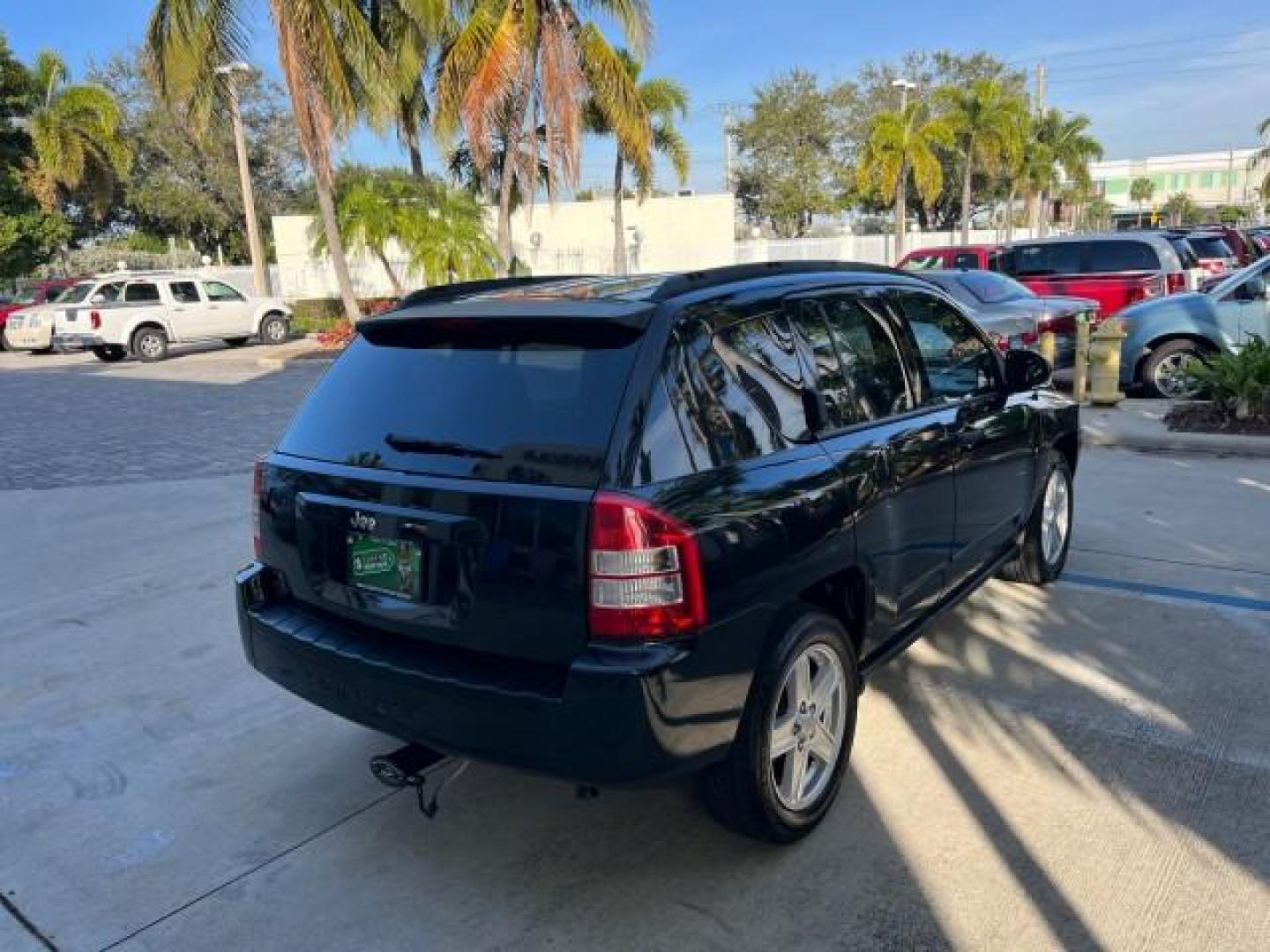 2008 Brilliant Blk Crystal Pearl /Dark Slate Gray Jeep Compass Sport LOW MILES 55,563 (1J8FT47W28D) with an 2.4L DOHC 16v I4 Dual VVT Engine engine, Automatic transmission, located at 4701 North Dixie Hwy, Pompano Beach, FL, 33064, (954) 422-2889, 26.240938, -80.123474 - OUR WEBPAGE FLORIDACARS1.COM HAS OVER 100 PHOTOS AND FREE CARFAX LINK 2008 JEEP COMPASS SPORT ROAD READY 2.4L I4 VIN: 1J8FT47W28D549845 NO ACCIDENTS 29 MPG 4 DOOR WAGON/SPORT UTILITY NO RECALLS 2.4L I4 F DOHC 16V FLORIDA OWNER GASOLINE LOW MILES 55,563 FRONT WHEEL DRIVE 9 SERVICE RECORDS Anti-Theft - Photo#7