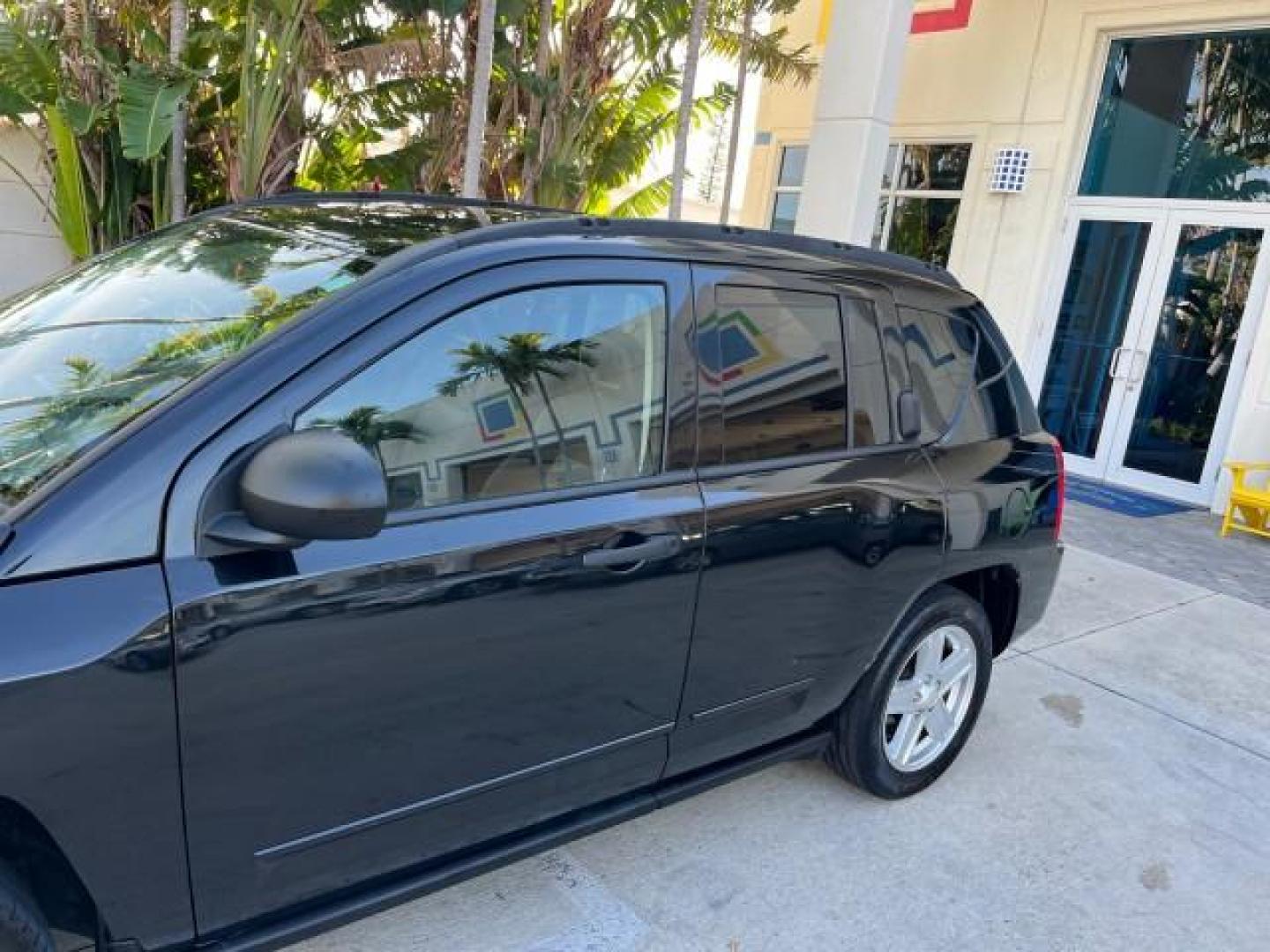 2008 Brilliant Blk Crystal Pearl /Dark Slate Gray Jeep Compass Sport LOW MILES 55,563 (1J8FT47W28D) with an 2.4L DOHC 16v I4 Dual VVT Engine engine, Automatic transmission, located at 4701 North Dixie Hwy, Pompano Beach, FL, 33064, (954) 422-2889, 26.240938, -80.123474 - OUR WEBPAGE FLORIDACARS1.COM HAS OVER 100 PHOTOS AND FREE CARFAX LINK 2008 JEEP COMPASS SPORT ROAD READY 2.4L I4 VIN: 1J8FT47W28D549845 NO ACCIDENTS 29 MPG 4 DOOR WAGON/SPORT UTILITY NO RECALLS 2.4L I4 F DOHC 16V FLORIDA OWNER GASOLINE LOW MILES 55,563 FRONT WHEEL DRIVE 9 SERVICE RECORDS Anti-Theft - Photo#84