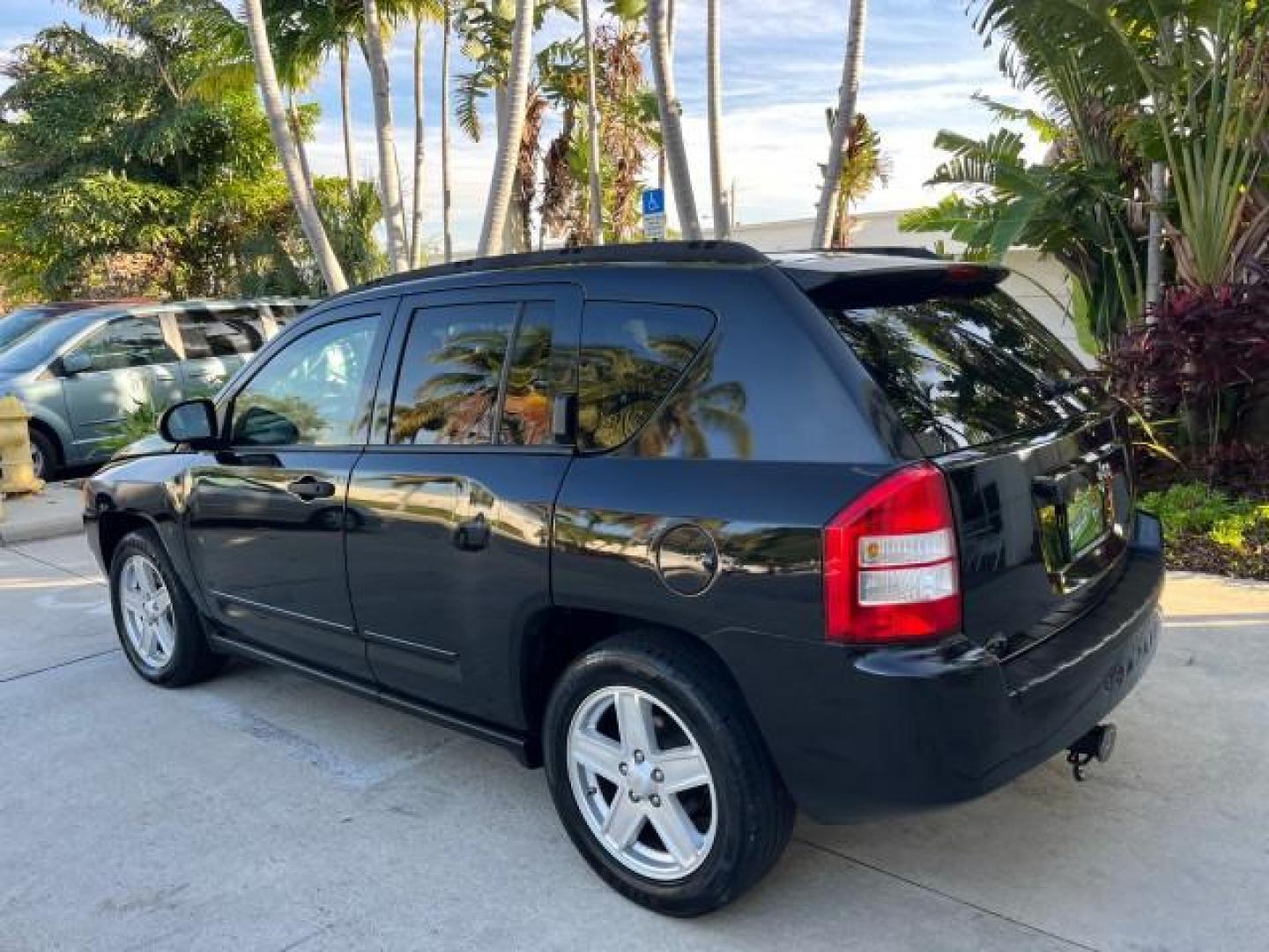 2008 Brilliant Blk Crystal Pearl /Dark Slate Gray Jeep Compass Sport LOW MILES 55,563 (1J8FT47W28D) with an 2.4L DOHC 16v I4 Dual VVT Engine engine, Automatic transmission, located at 4701 North Dixie Hwy, Pompano Beach, FL, 33064, (954) 422-2889, 26.240938, -80.123474 - OUR WEBPAGE FLORIDACARS1.COM HAS OVER 100 PHOTOS AND FREE CARFAX LINK 2008 JEEP COMPASS SPORT ROAD READY 2.4L I4 VIN: 1J8FT47W28D549845 NO ACCIDENTS 29 MPG 4 DOOR WAGON/SPORT UTILITY NO RECALLS 2.4L I4 F DOHC 16V FLORIDA OWNER GASOLINE LOW MILES 55,563 FRONT WHEEL DRIVE 9 SERVICE RECORDS Anti-Theft - Photo#94