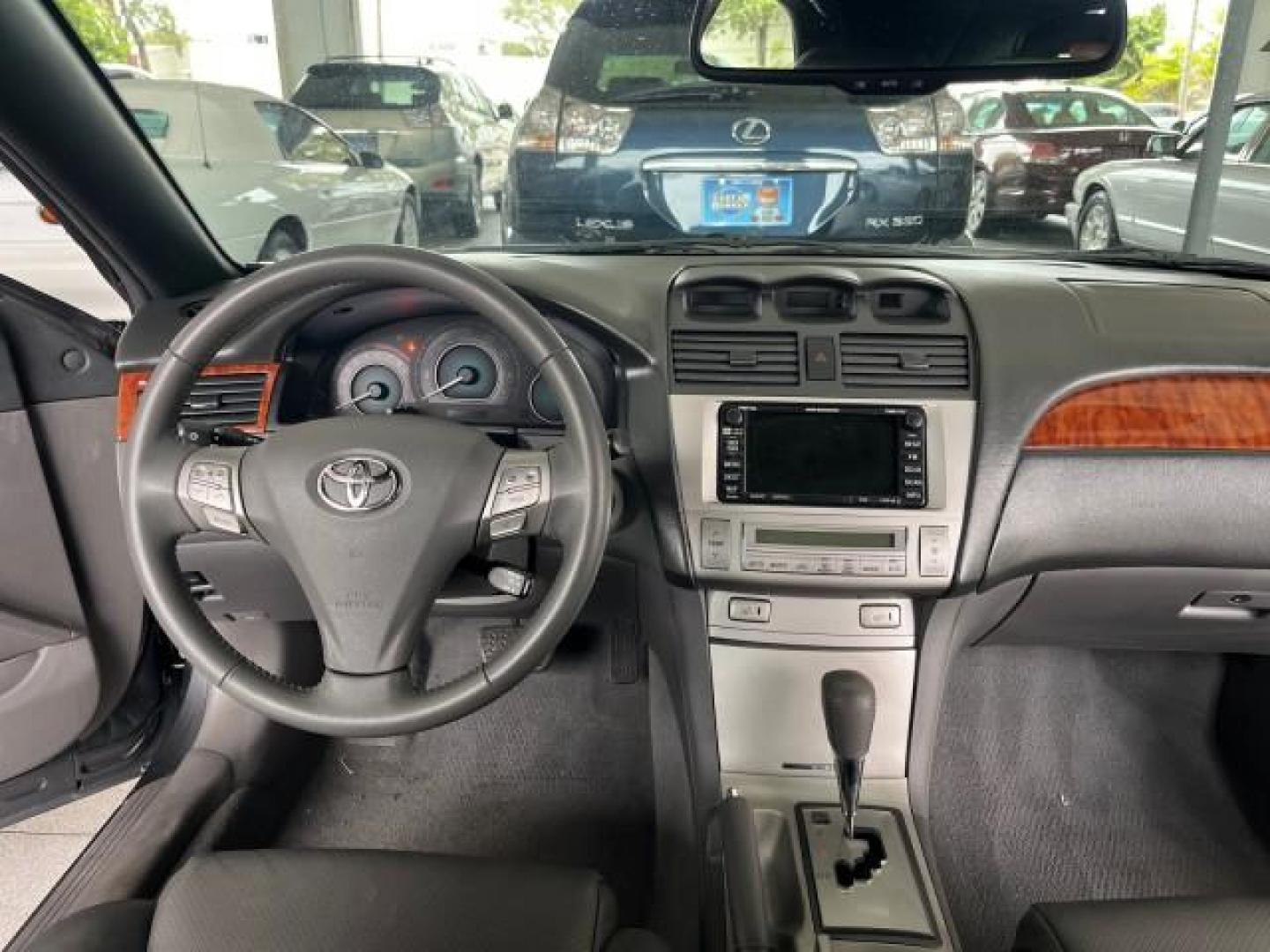 2007 Magnetic Gray Metallic /Dark Gray Toyota Camry Solara SLE LOW MILES 74,727 (4T1FA38P17U) with an 3.3L DOHC SMPI VVT-i 24-Valve V6 Engine engine, Automatic transmission, located at 4701 North Dixie Hwy, Pompano Beach, FL, 33064, (954) 422-2889, 26.240938, -80.123474 - OUR WEBPAGE FLORIDACARS1.COM HAS OVER 100 PHOTOS AND FREE CARFAX LINK 2007 TOYOTA CAMRY SOLARA SE V6 ROAD READY 3.3L V6 VIN: 4T1FA38P17U115151 NO RECALLS 29 MPG CONVERTIBLE POWER CONVERTIBLE TOP 3.3L V6 F DOHC 24V POWER LEATHER SEATS GASOLINE LOW MILES 74,727 29 MPG FRONT WHEEL DRIVE FLORIDA OWNER N - Photo#49