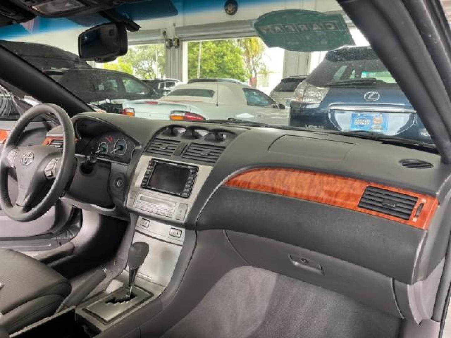 2007 Magnetic Gray Metallic /Dark Gray Toyota Camry Solara SLE LOW MILES 74,727 (4T1FA38P17U) with an 3.3L DOHC SMPI VVT-i 24-Valve V6 Engine engine, Automatic transmission, located at 4701 North Dixie Hwy, Pompano Beach, FL, 33064, (954) 422-2889, 26.240938, -80.123474 - OUR WEBPAGE FLORIDACARS1.COM HAS OVER 100 PHOTOS AND FREE CARFAX LINK 2007 TOYOTA CAMRY SOLARA SE V6 ROAD READY 3.3L V6 VIN: 4T1FA38P17U115151 NO RECALLS 29 MPG CONVERTIBLE POWER CONVERTIBLE TOP 3.3L V6 F DOHC 24V POWER LEATHER SEATS GASOLINE LOW MILES 74,727 29 MPG FRONT WHEEL DRIVE FLORIDA OWNER N - Photo#51