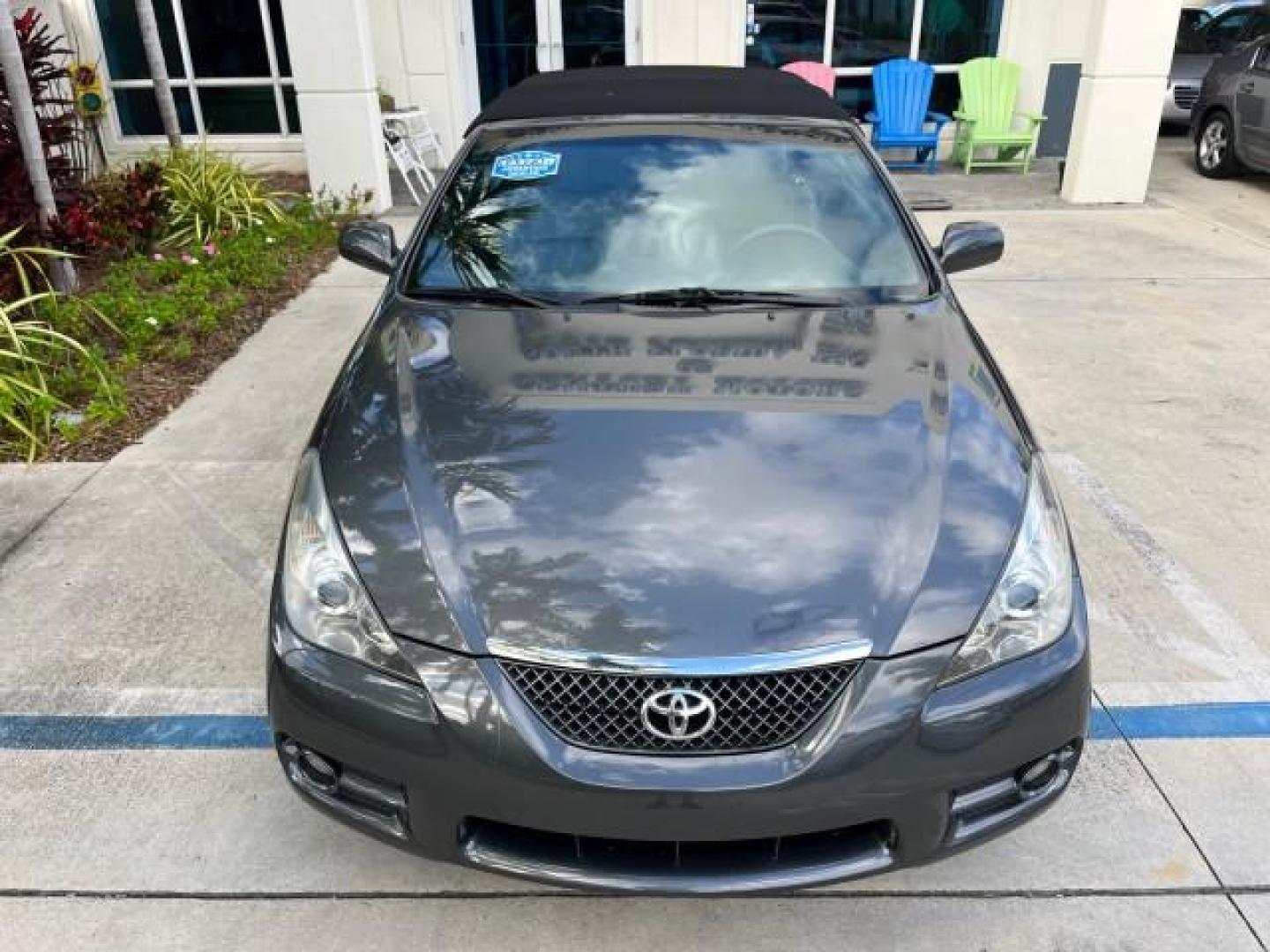 2007 Magnetic Gray Metallic /Dark Gray Toyota Camry Solara SLE LOW MILES 74,727 (4T1FA38P17U) with an 3.3L DOHC SMPI VVT-i 24-Valve V6 Engine engine, Automatic transmission, located at 4701 North Dixie Hwy, Pompano Beach, FL, 33064, (954) 422-2889, 26.240938, -80.123474 - OUR WEBPAGE FLORIDACARS1.COM HAS OVER 100 PHOTOS AND FREE CARFAX LINK 2007 TOYOTA CAMRY SOLARA SE V6 ROAD READY 3.3L V6 VIN: 4T1FA38P17U115151 NO RECALLS 29 MPG CONVERTIBLE POWER CONVERTIBLE TOP 3.3L V6 F DOHC 24V POWER LEATHER SEATS GASOLINE LOW MILES 74,727 29 MPG FRONT WHEEL DRIVE FLORIDA OWNER N - Photo#71