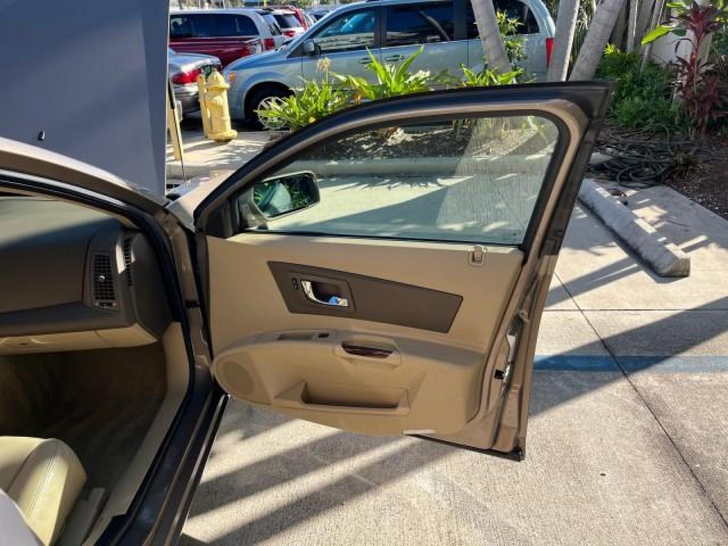 2006 Sand Storm /Cashmere Cadillac CTS LOW MILES 23,742 (1G6DP577860) with an 3.6L V6 VVT Engine engine, Automatic transmission, located at 4701 North Dixie Hwy, Pompano Beach, FL, 33064, (954) 422-2889, 26.240938, -80.123474 - OUR WEBPAGE FLORIDACARS1.COM HAS OVER 100 PHOTOS AND FREE CARFAX LINK 2006 CADILLAC CTS NEW $40,770 3.6L V6 VIN: 1G6DP577860129290 FLORIDA OWNER 27 MPG SEDAN 4 DR SUPER LOW MILES 23,746 3.6L V6 F POWER LEATHER SEATS GASOLINE POWER SUNROOF REAR WHEEL DRIVE 6 SERVICE RECORDS Anti-Theft System Approach - Photo#11